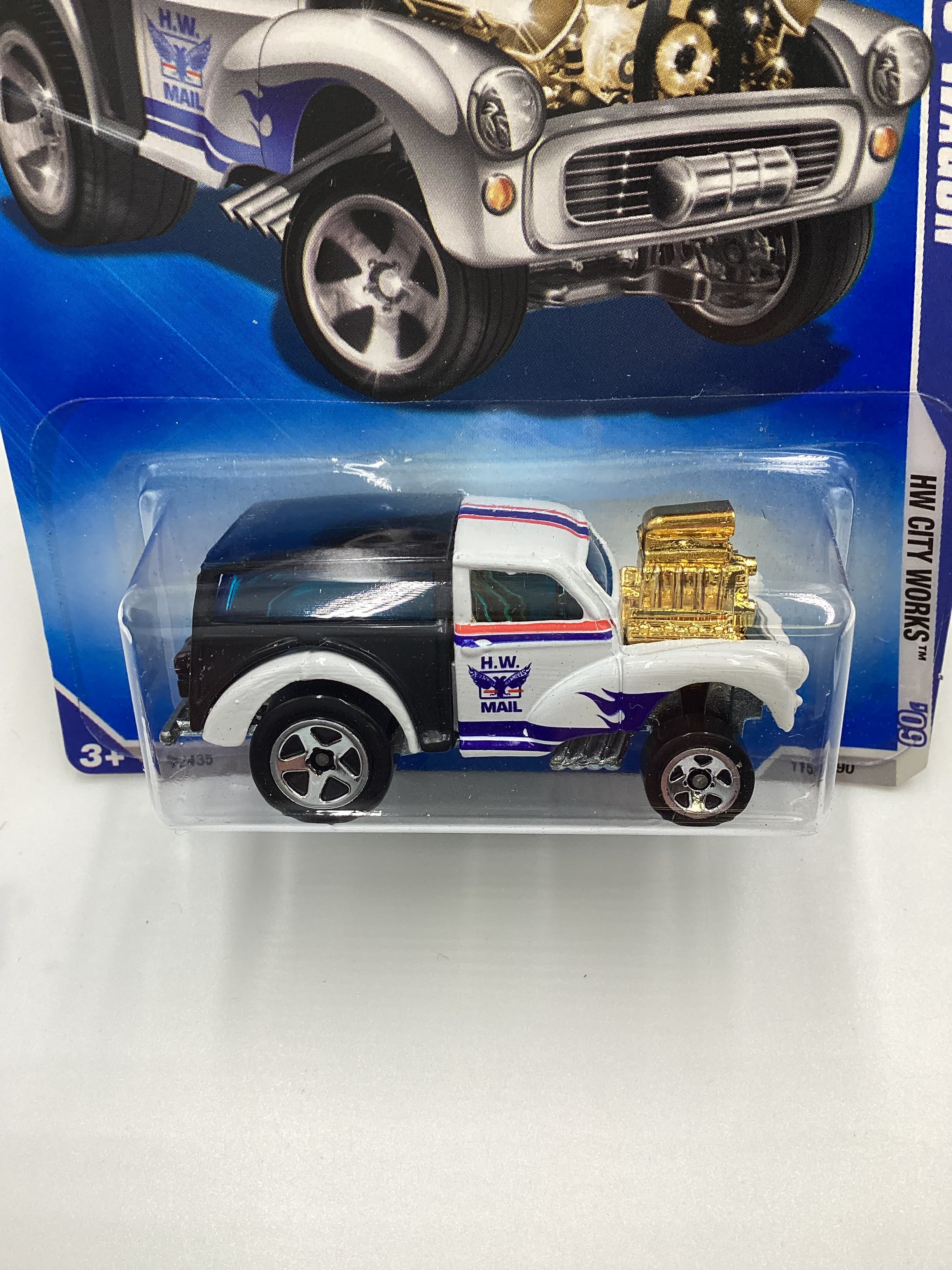 2009 Hot Wheels #115 Morris Wagon HW Mail GG1 - Image 3
