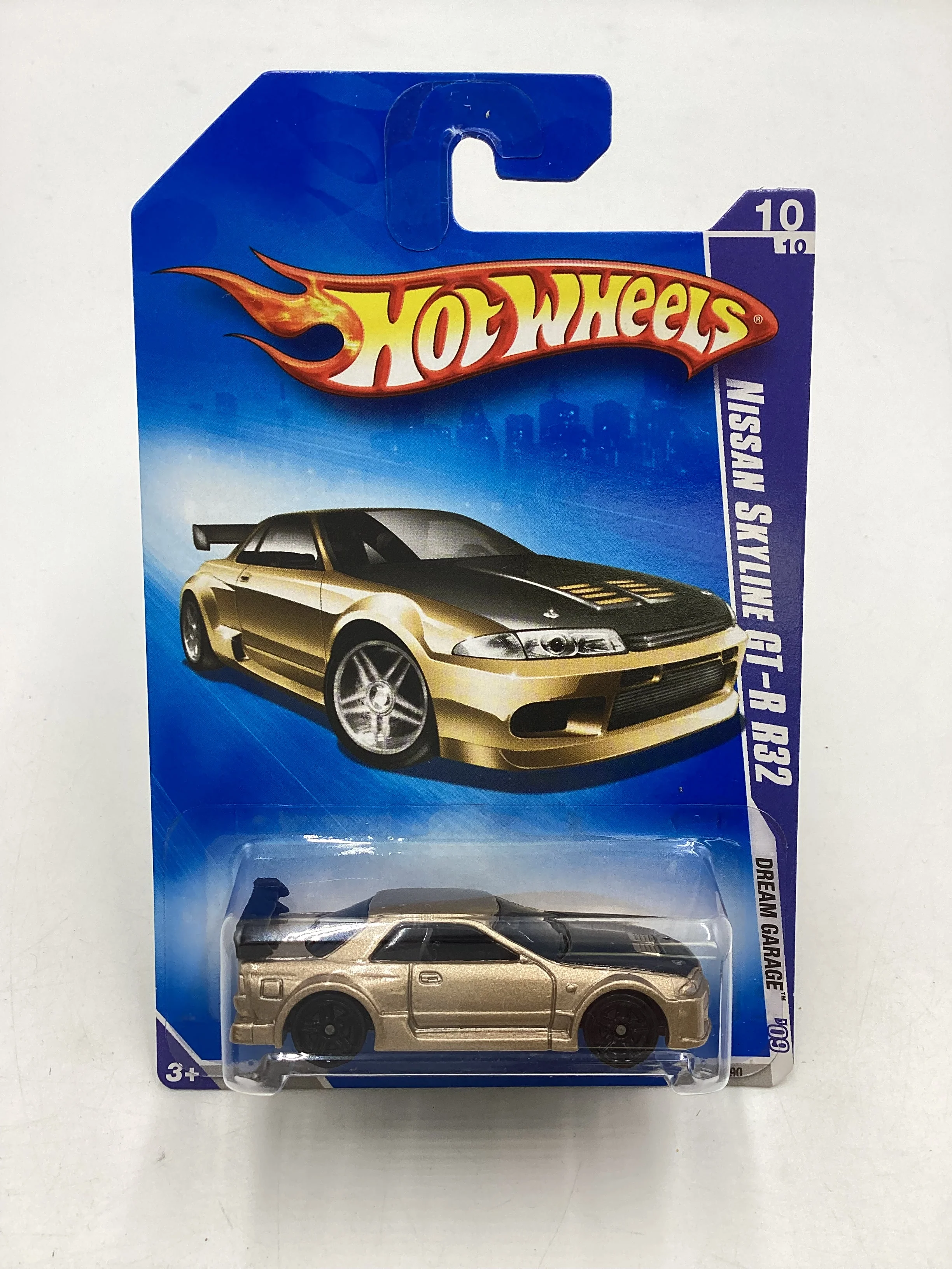 2009 Hot Wheels #156 Nissan Skyline GT-R R32 Gold  W/Protector - Image 2