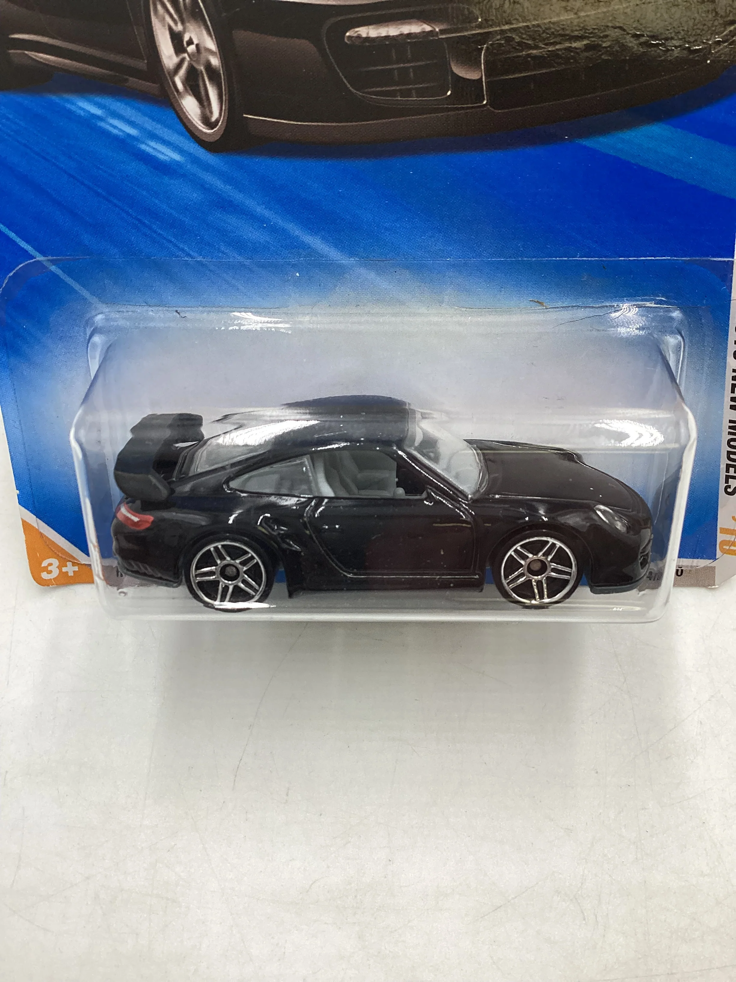 2010 Hot Wheels #014 Black Porsche 911 GT2 *Creased Card* SR - Image 3
