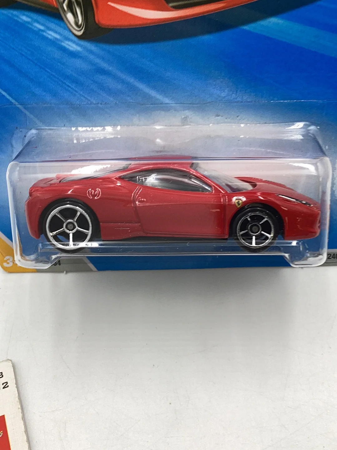2010 Hot Wheels #34 Ferrari 458 Italia with protector - Image 2