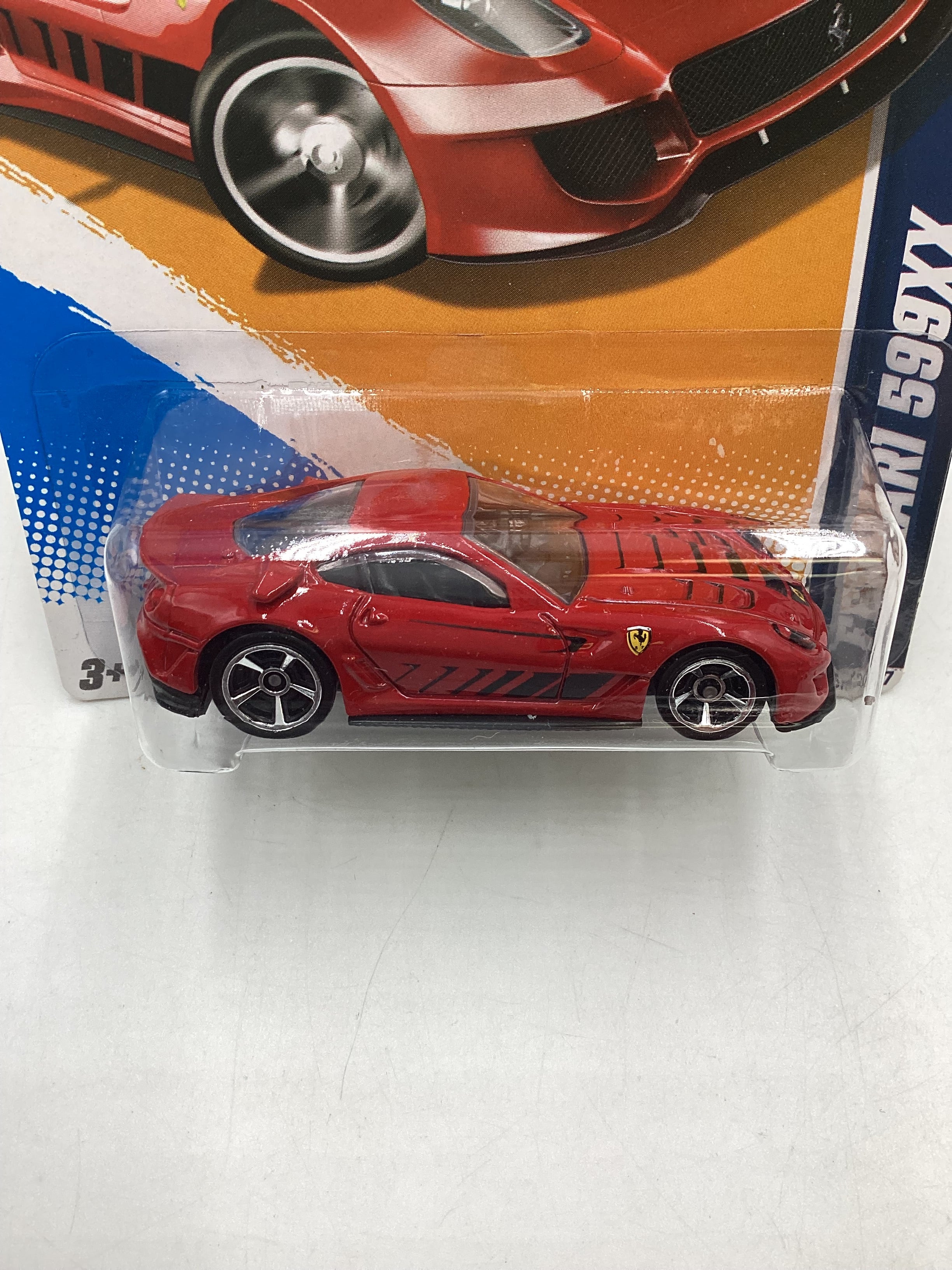 2012 Hot wheels #125 Red Ferrari 599XX with protector - Image 3
