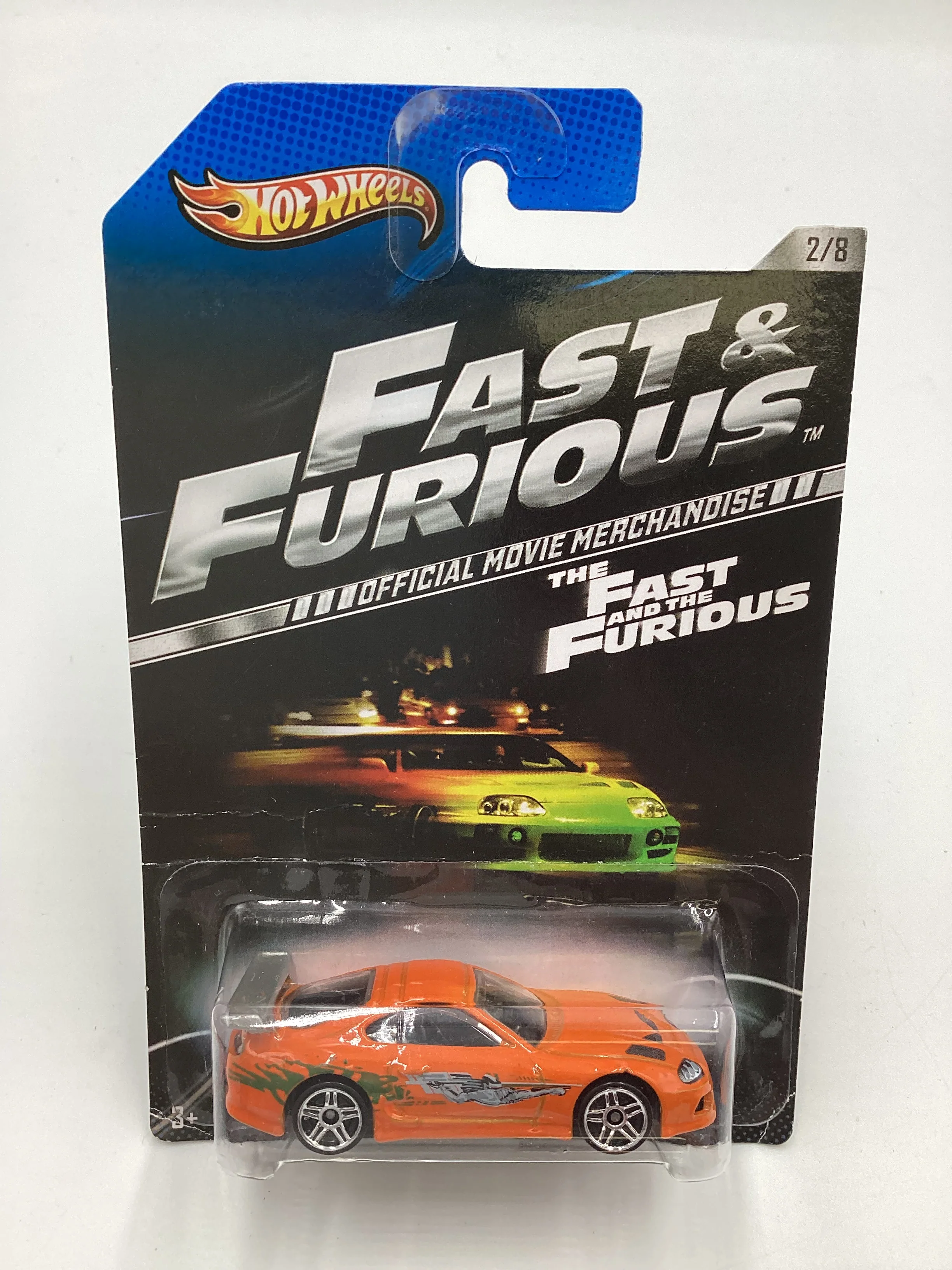 2014 Hot Wheels Fast & Furious #2 Toyota Supra Orange with Silver Wing and protector - Image 2