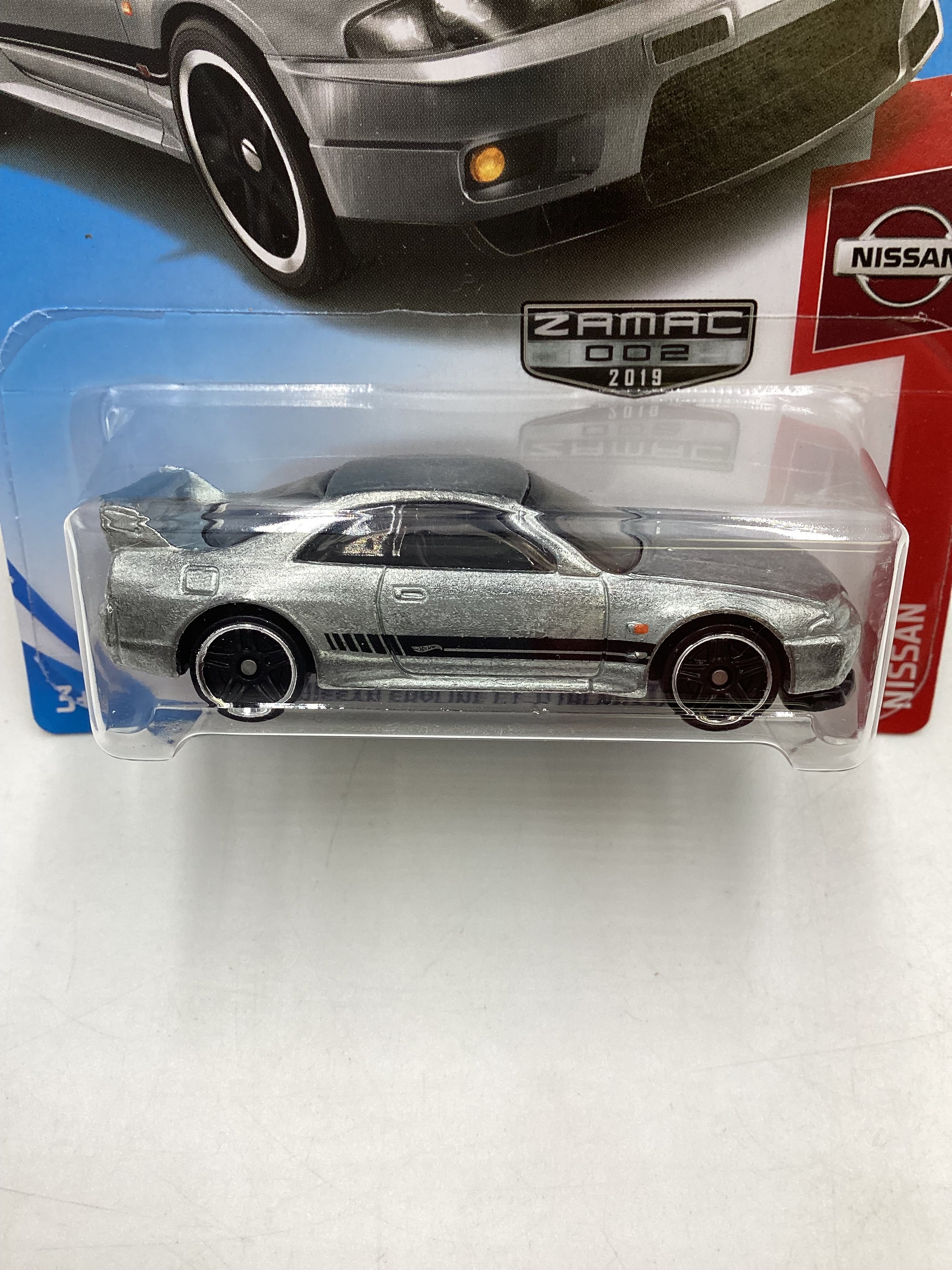 2019 Hot Wheels #006 Zamac Nissan Skyline GT-R R33 (BCNR33) - Image 3
