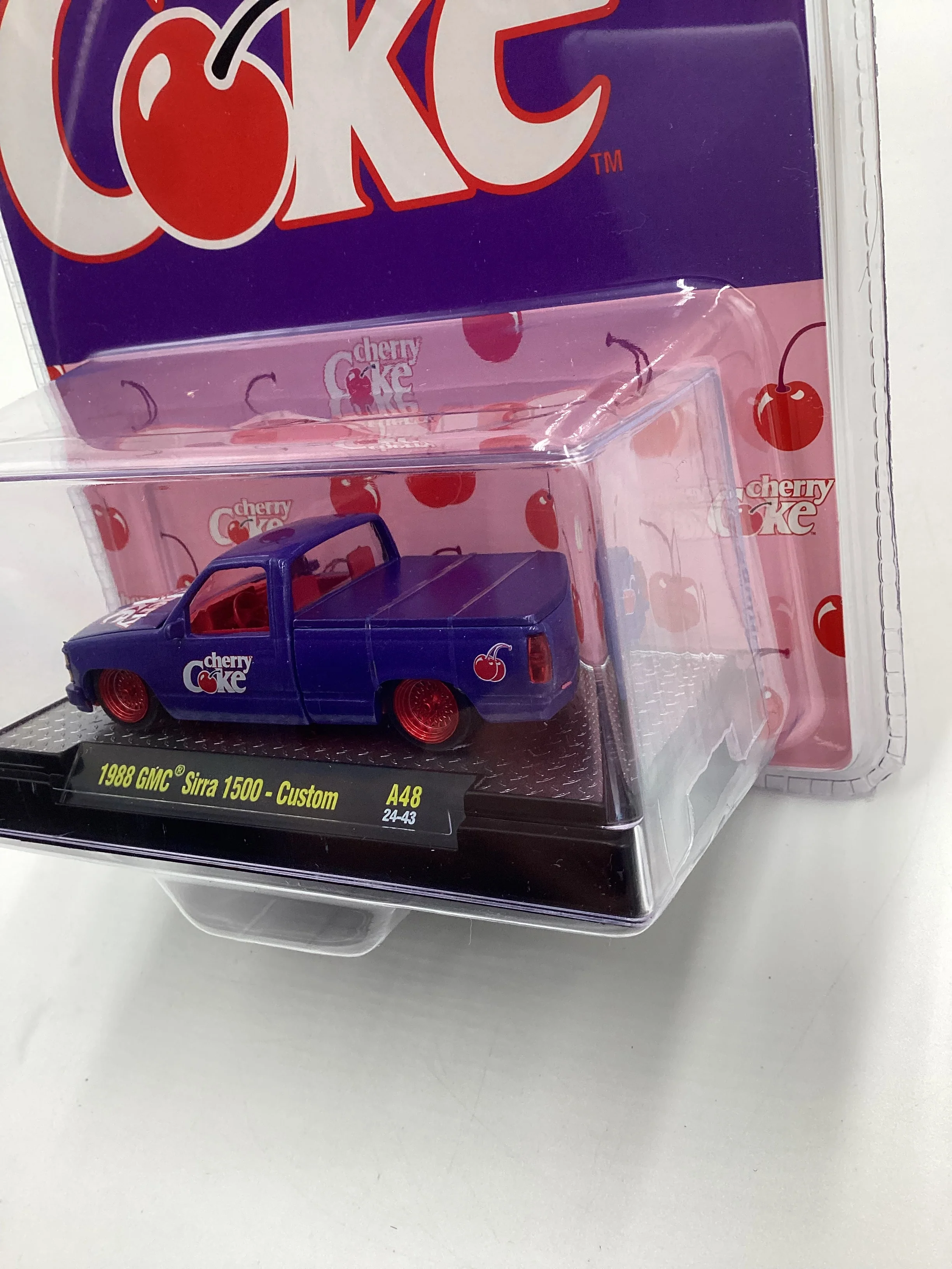 2024 M2 Machines Cherry Coke (Sirra Error) CHASE 1988 GMC Sierra 1500 Custom Purple A48 - Image 4