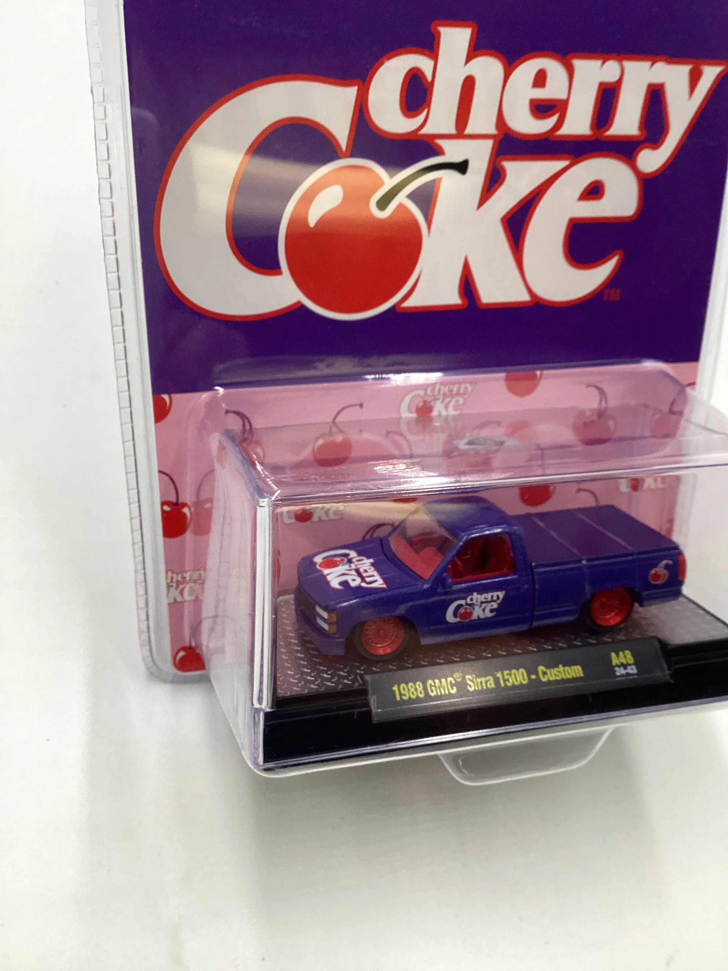 2024 M2 Machines Cherry Coke (Sirra Error) CHASE 1988 GMC Sierra 1500 Custom Purple A48 - Image 5
