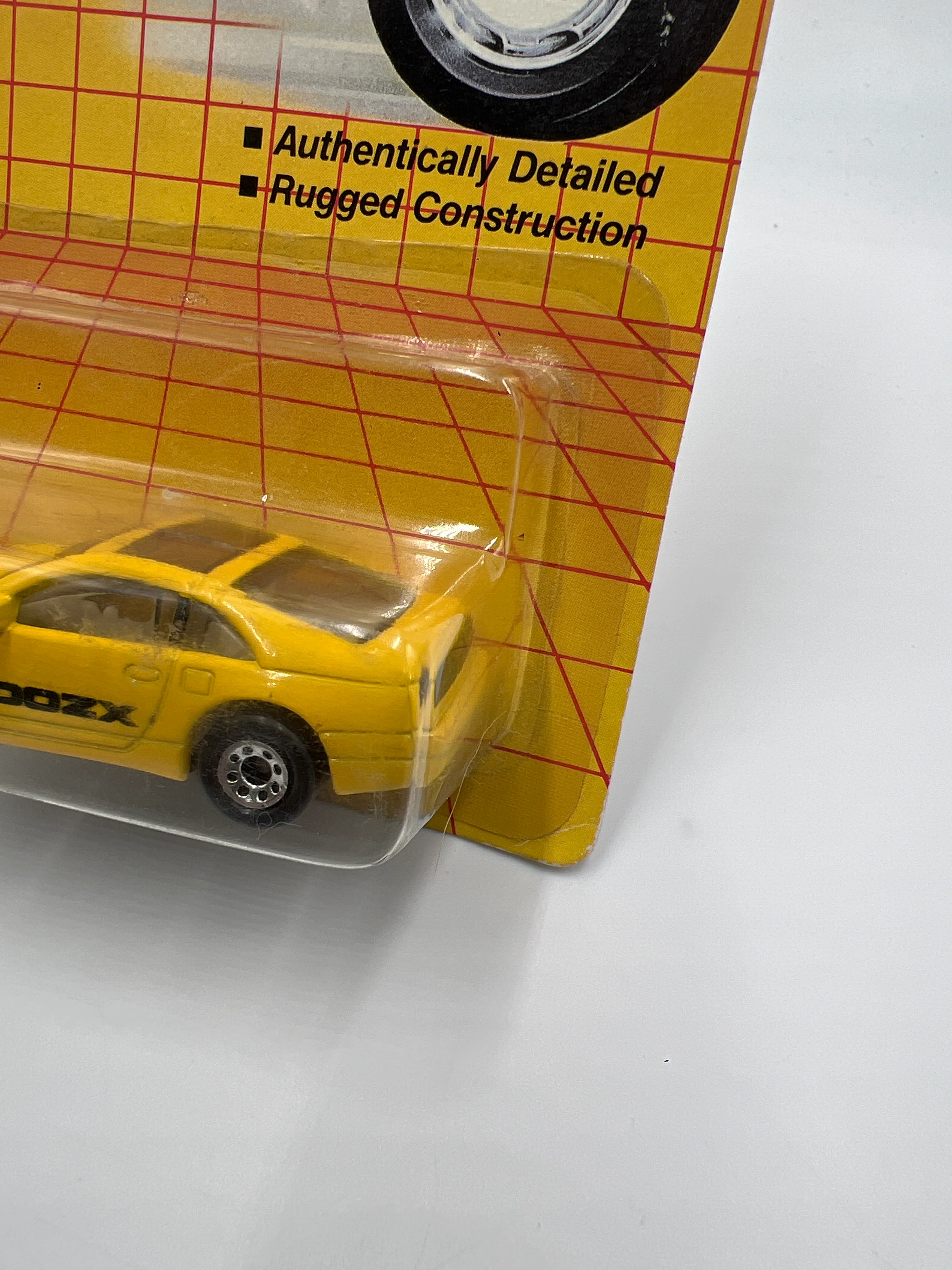 1990 Matchbox Motors MB #61 300ZX Yellow W/Protector Bad Card SR - Image 5