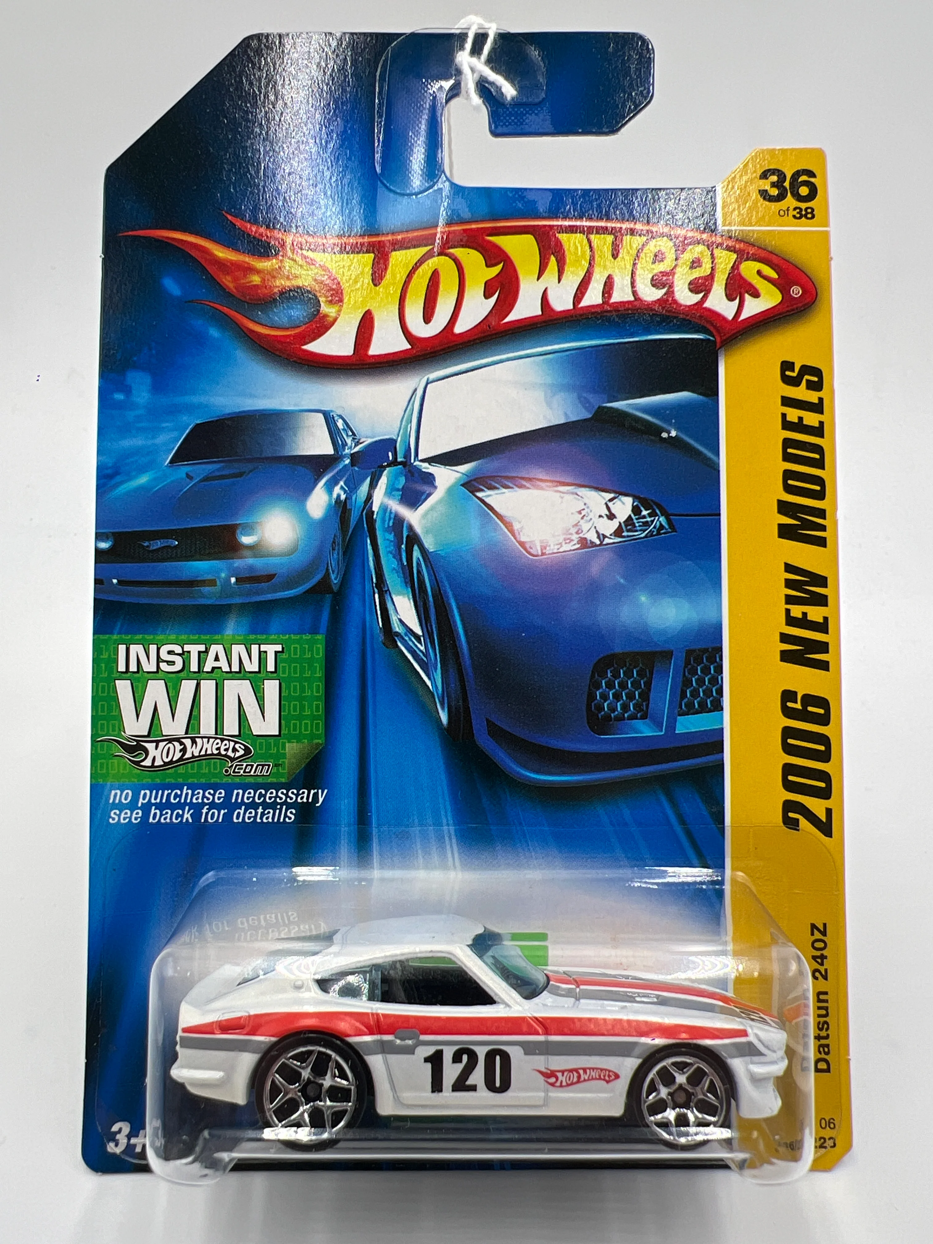 2006 Hot Wheels New Models #36 Yellow Datsun 240Z White 86C - Image 2
