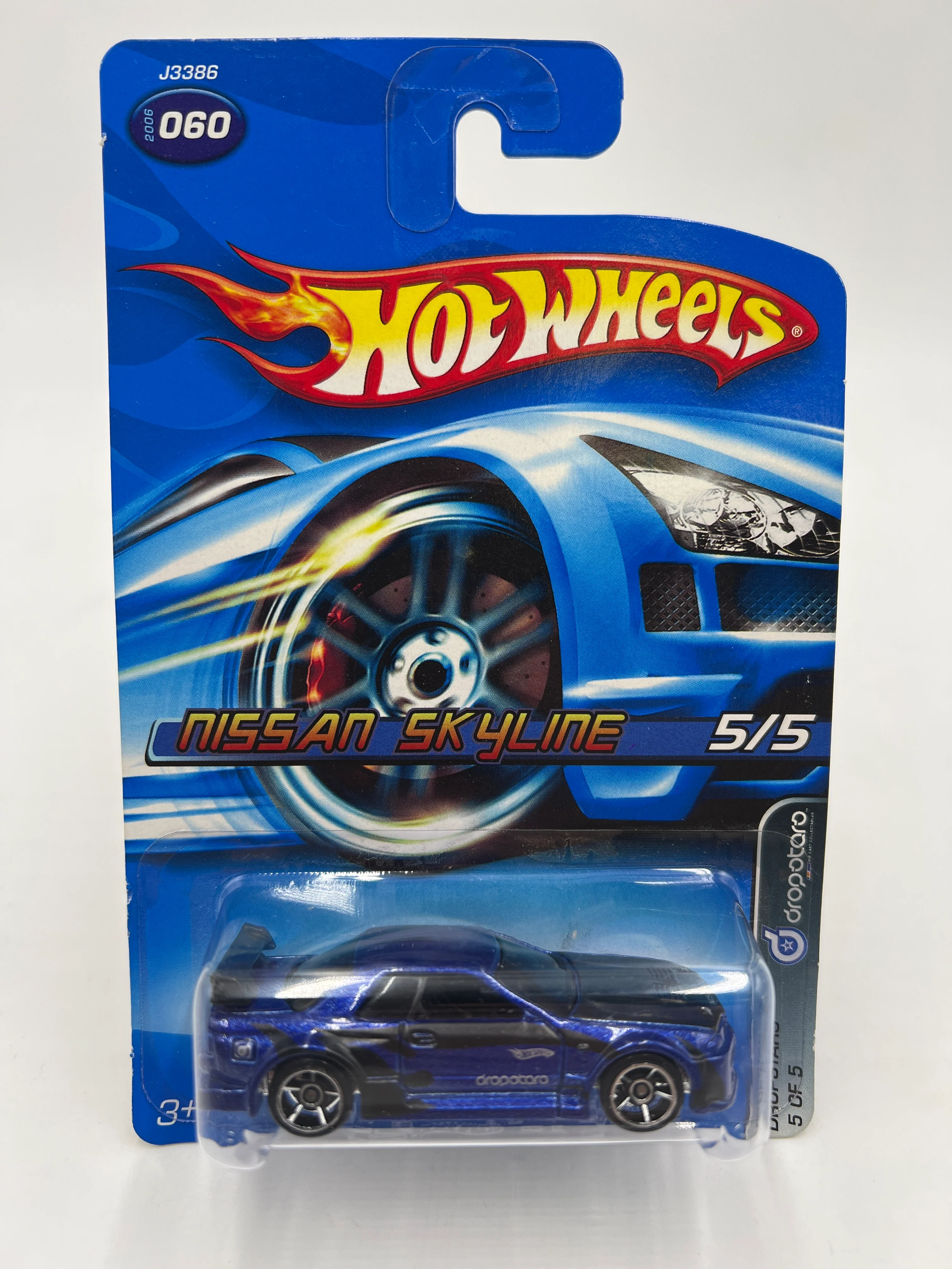 2006 Hot Wheels Dropstars #060 Nissan Skyline Dark Blue HTF W/Protector - Image 2