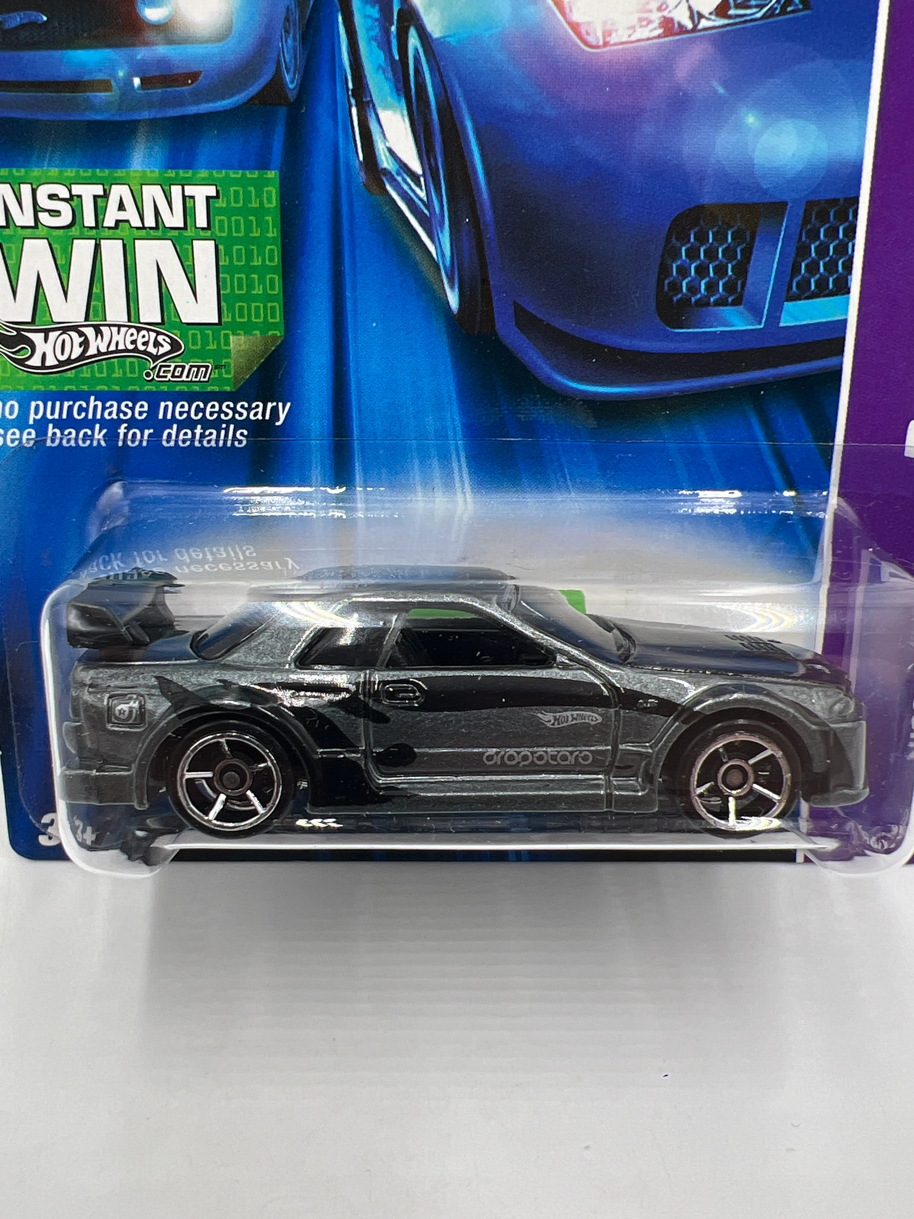 2006 Hot Wheels Dropstars #60 Nissan Skyline Gray W/Protector - Image 2