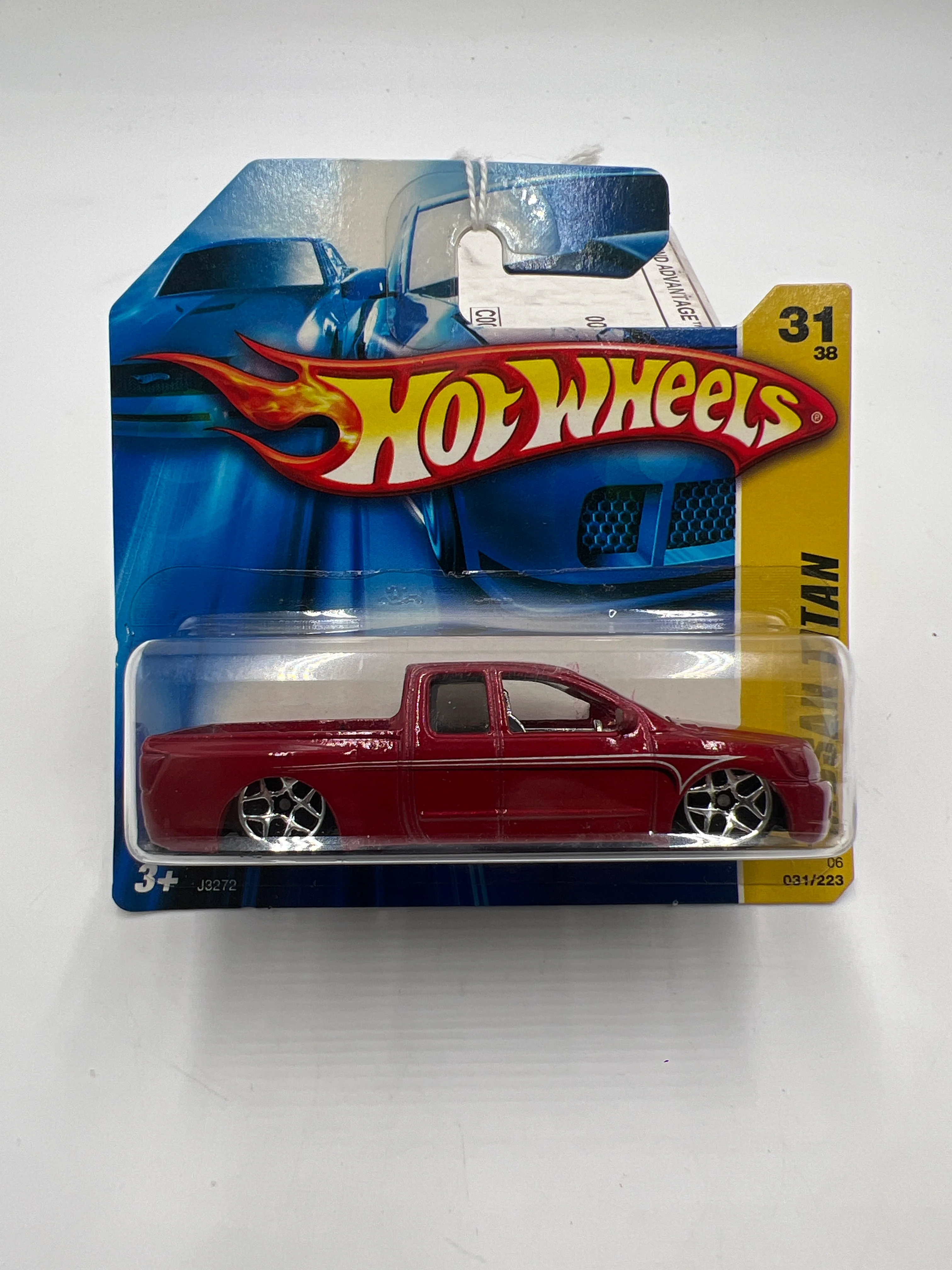 2006 Hot Wheels New Models #31 Nissan Titan Red Short Card W/Protector - Image 2
