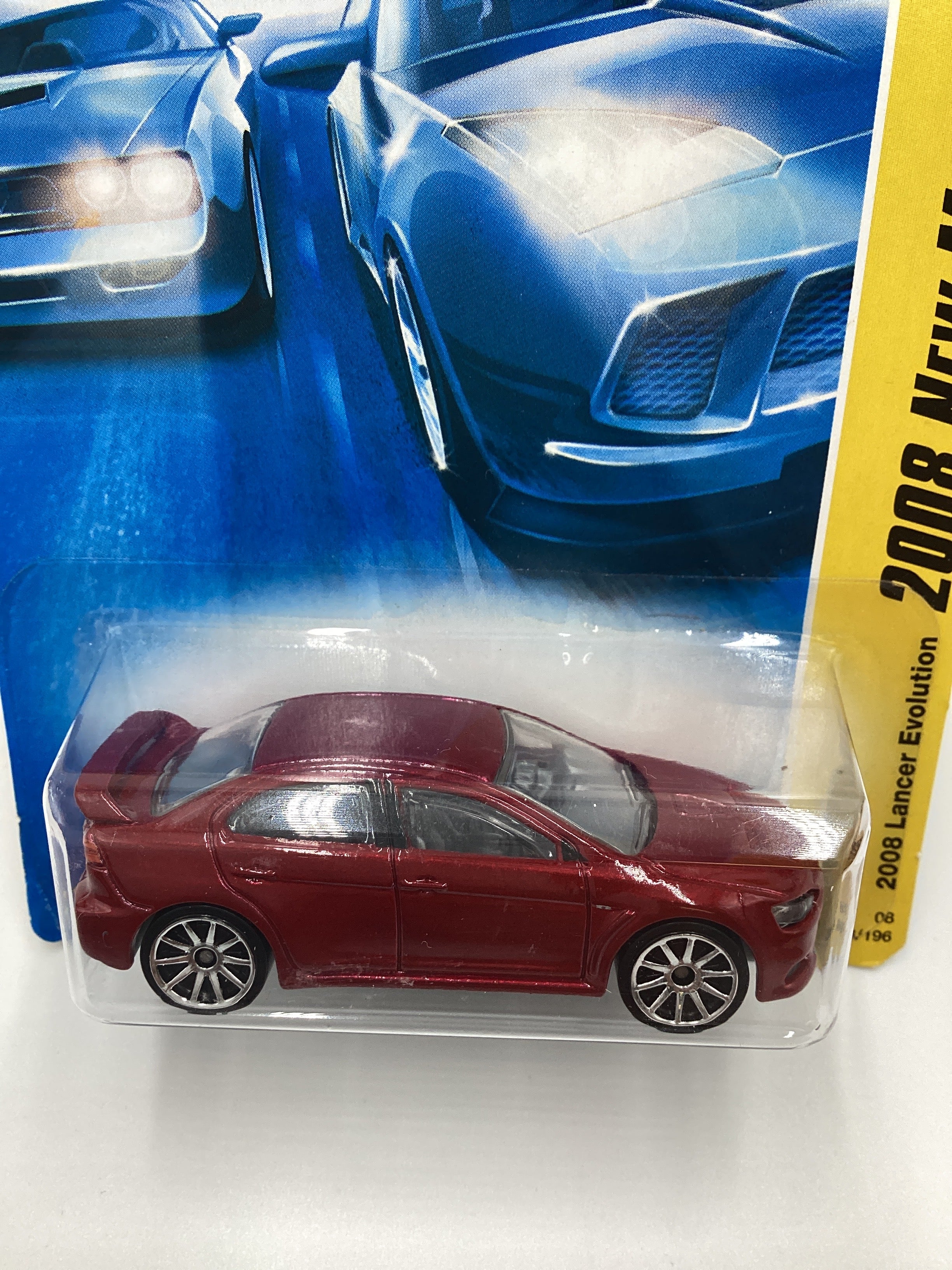 2008 Hot wheels #23 2008 Lancer Evolution Red 92D - Image 3
