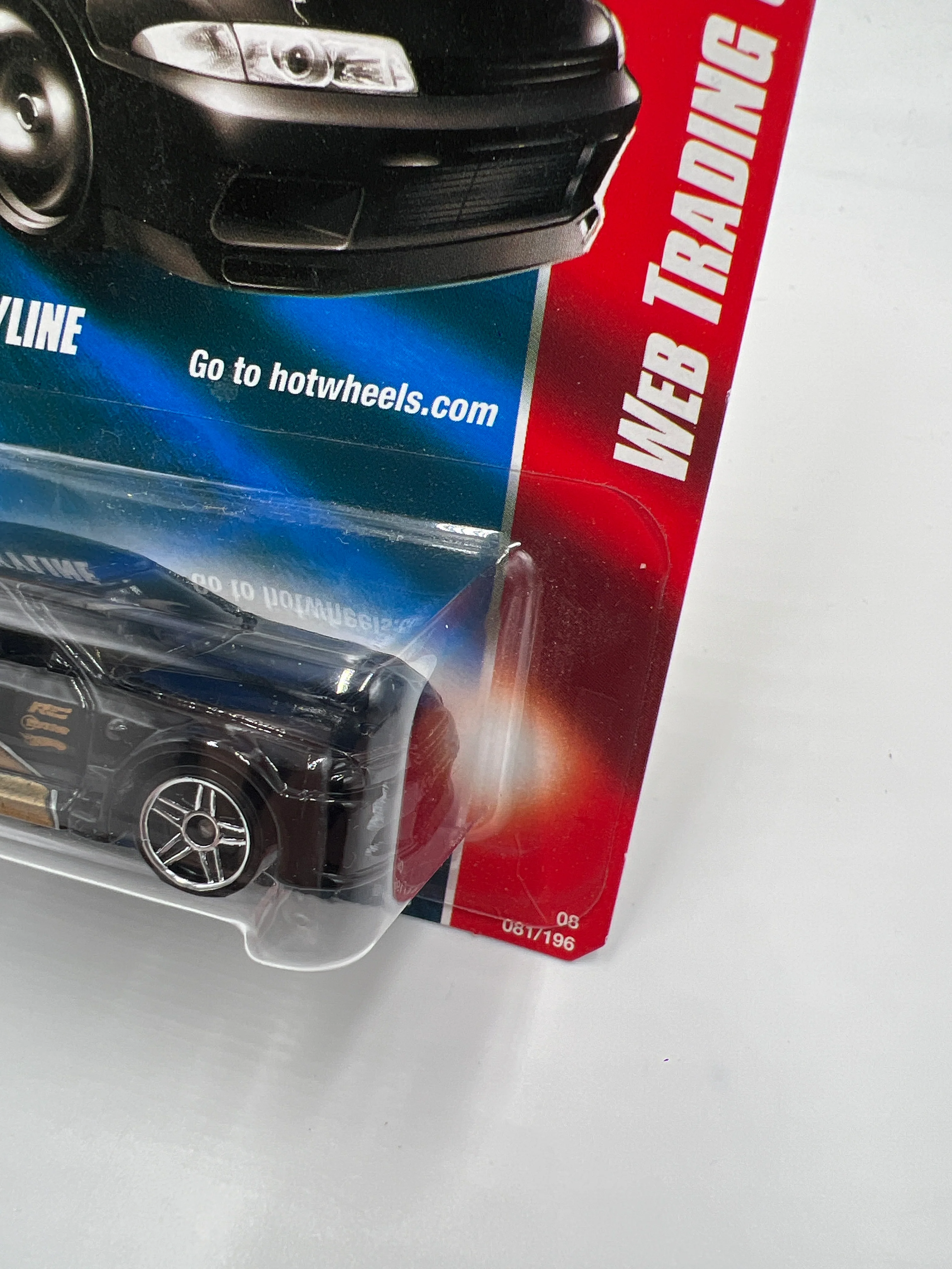 2008 Hot Wheels Web Trading Cars #81 Nissan Skyline Black/Gold W/Protector - Image 4