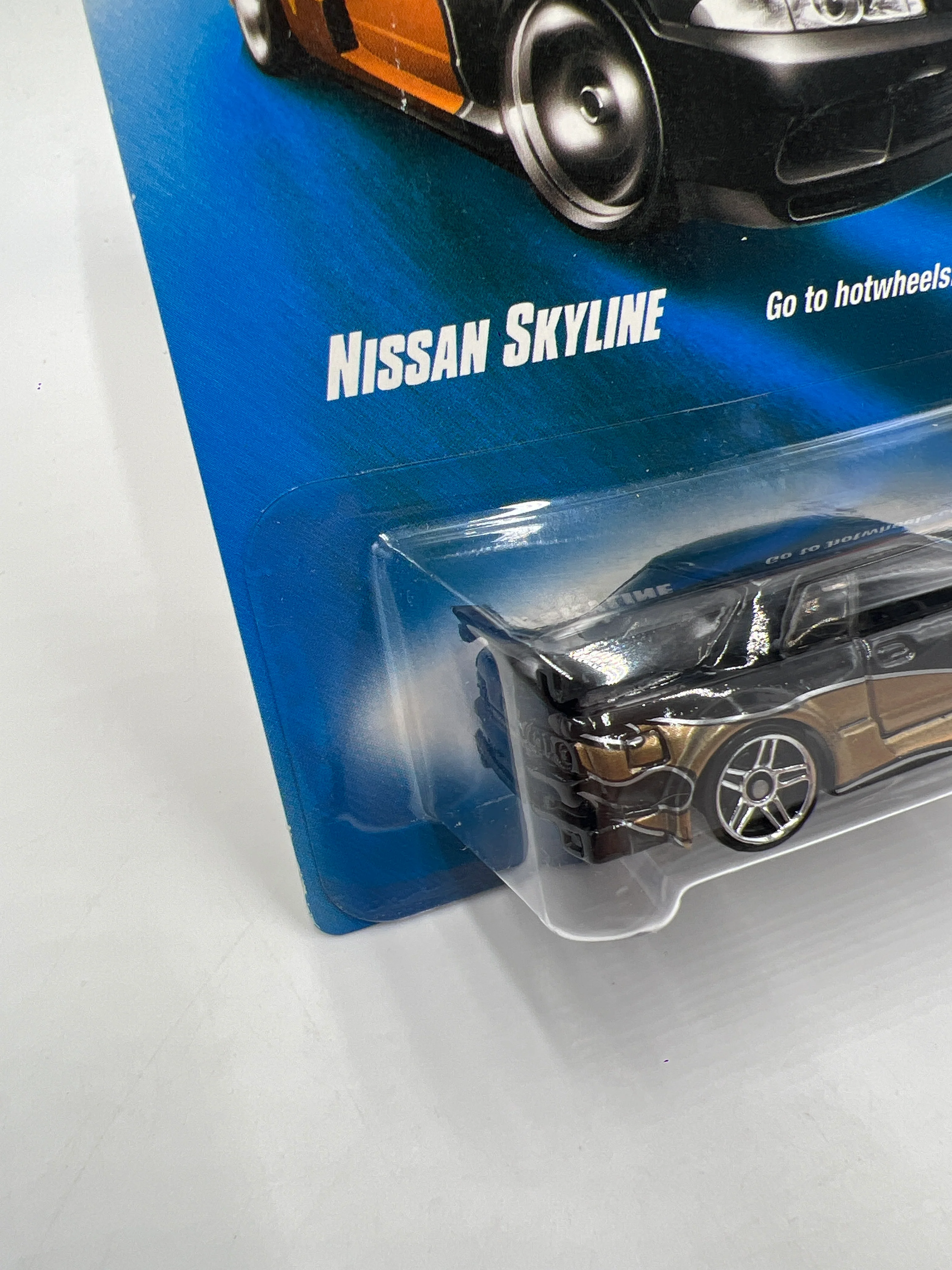 2008 Hot Wheels Web Trading Cars #81 Nissan Skyline Black/Gold W/Protector - Image 4