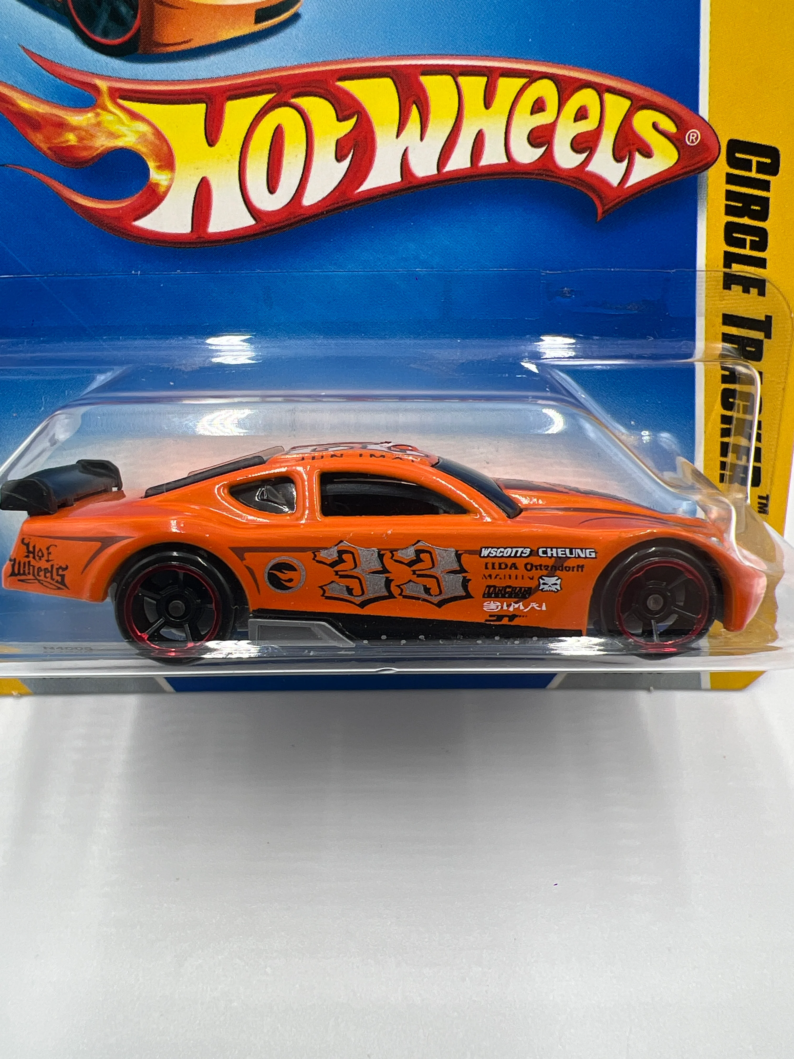 2009 Hot Wheels New Models Premiere #2 Circle Tracker Orange Short Card 113A - Image 3