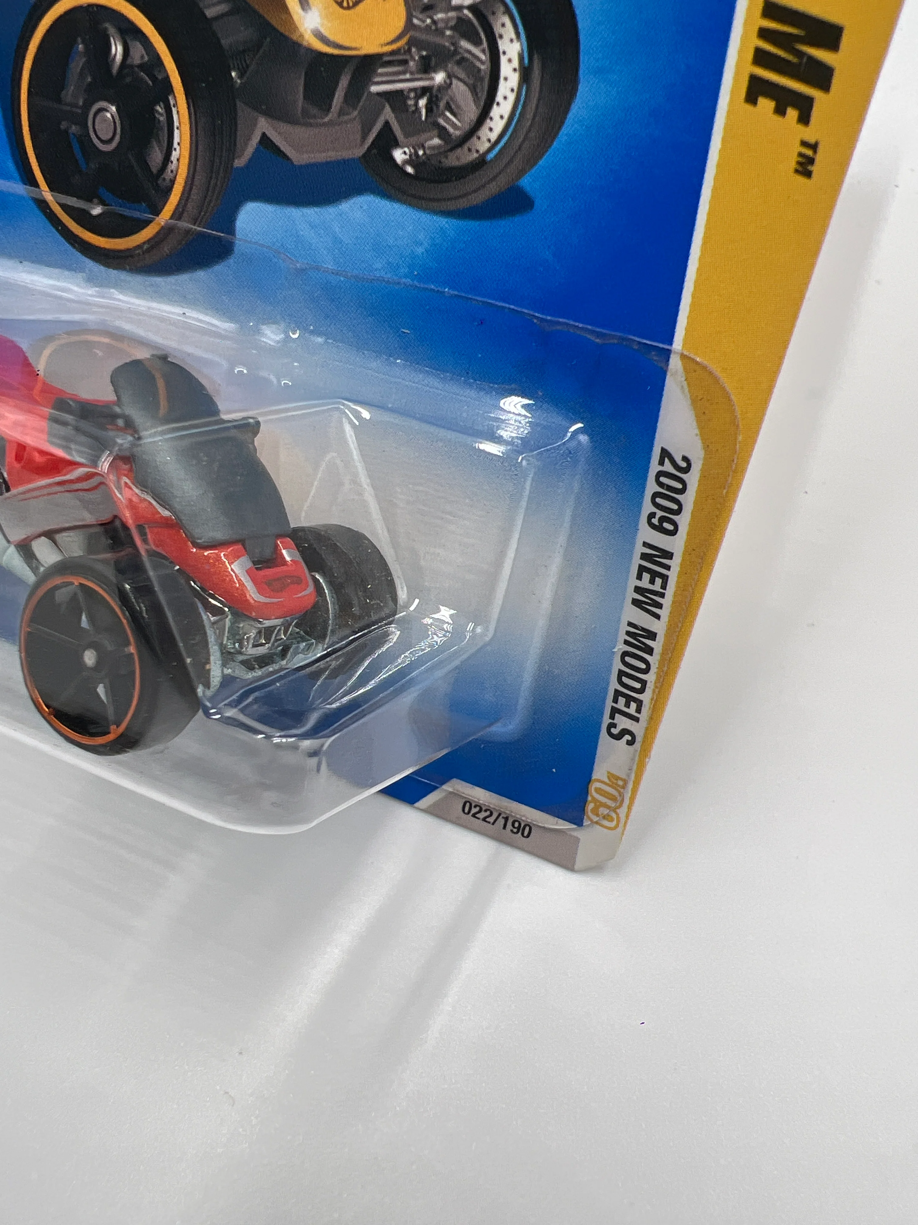 2009 Hot Wheels New Models #22 Tri & Stop Me Orange BB9 - Image 4