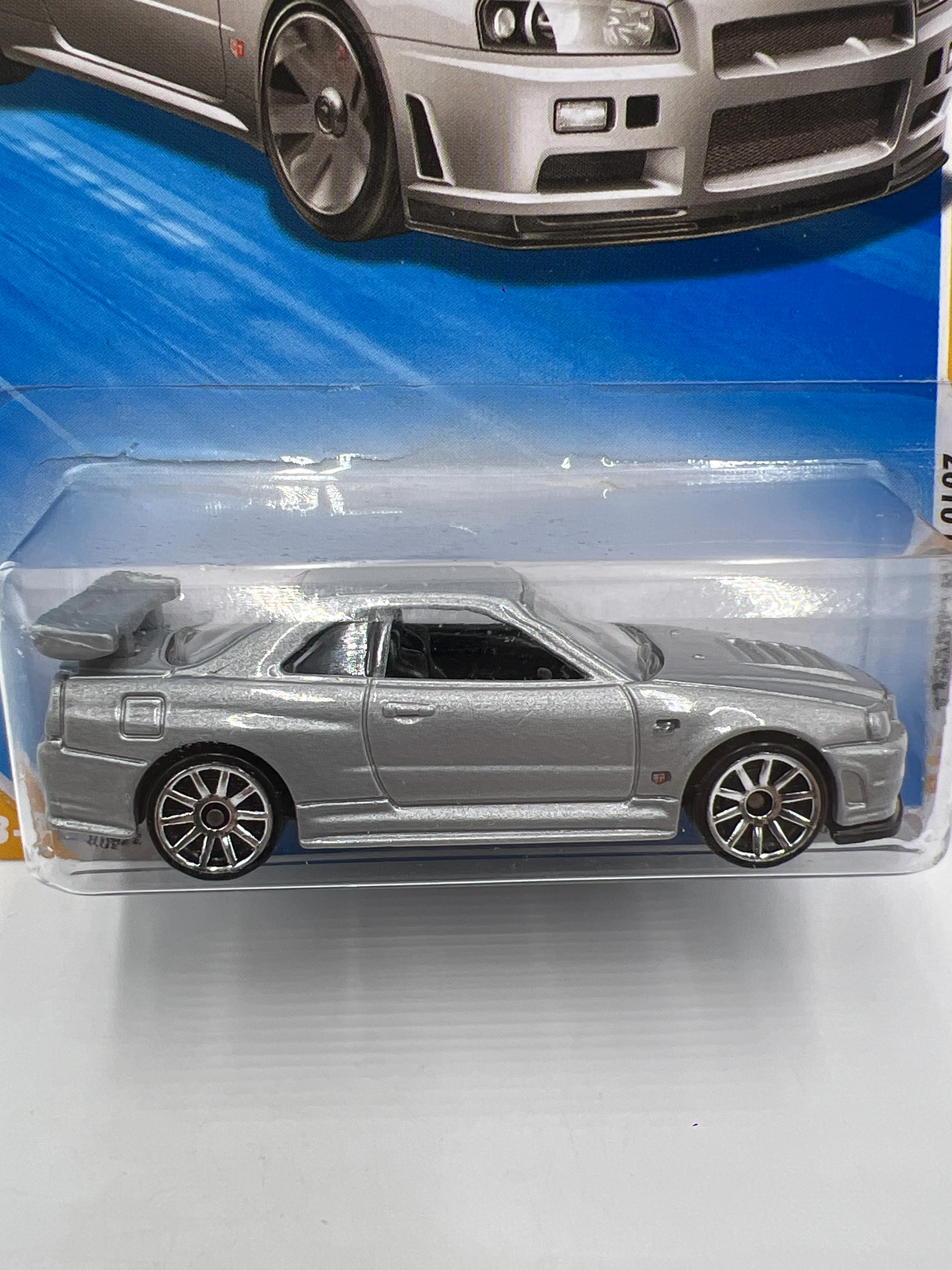 2010 Hot Wheels New Models #7 Nissan Skyline GT-R R34 Silver W/Protector - Image 2