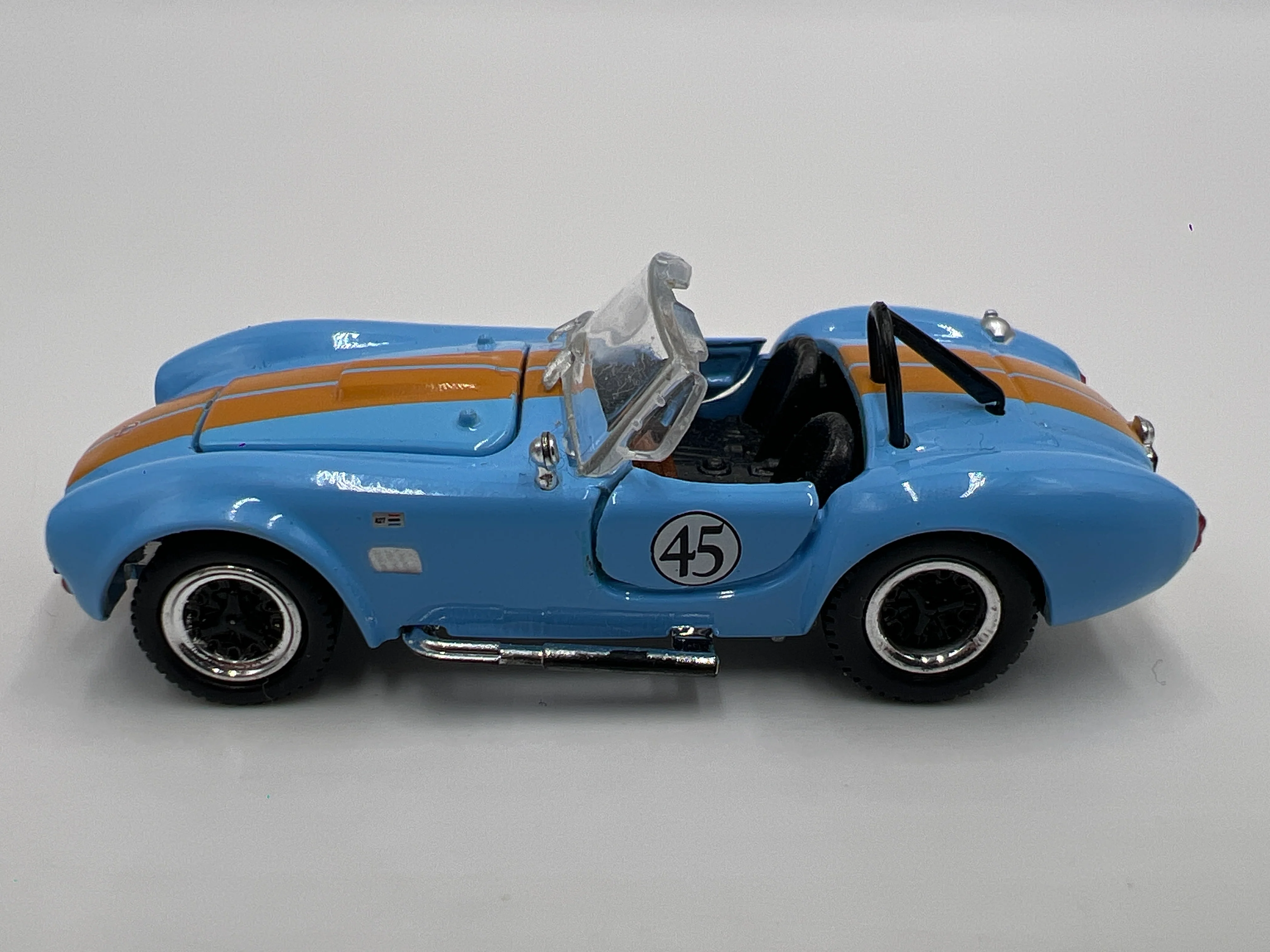 2010 Shelby Collectibles 1/64 10 Car Set Exclusive 1/5000 Loose Shelby Cobra 427 S/C Light Blue/Orange - Image 5