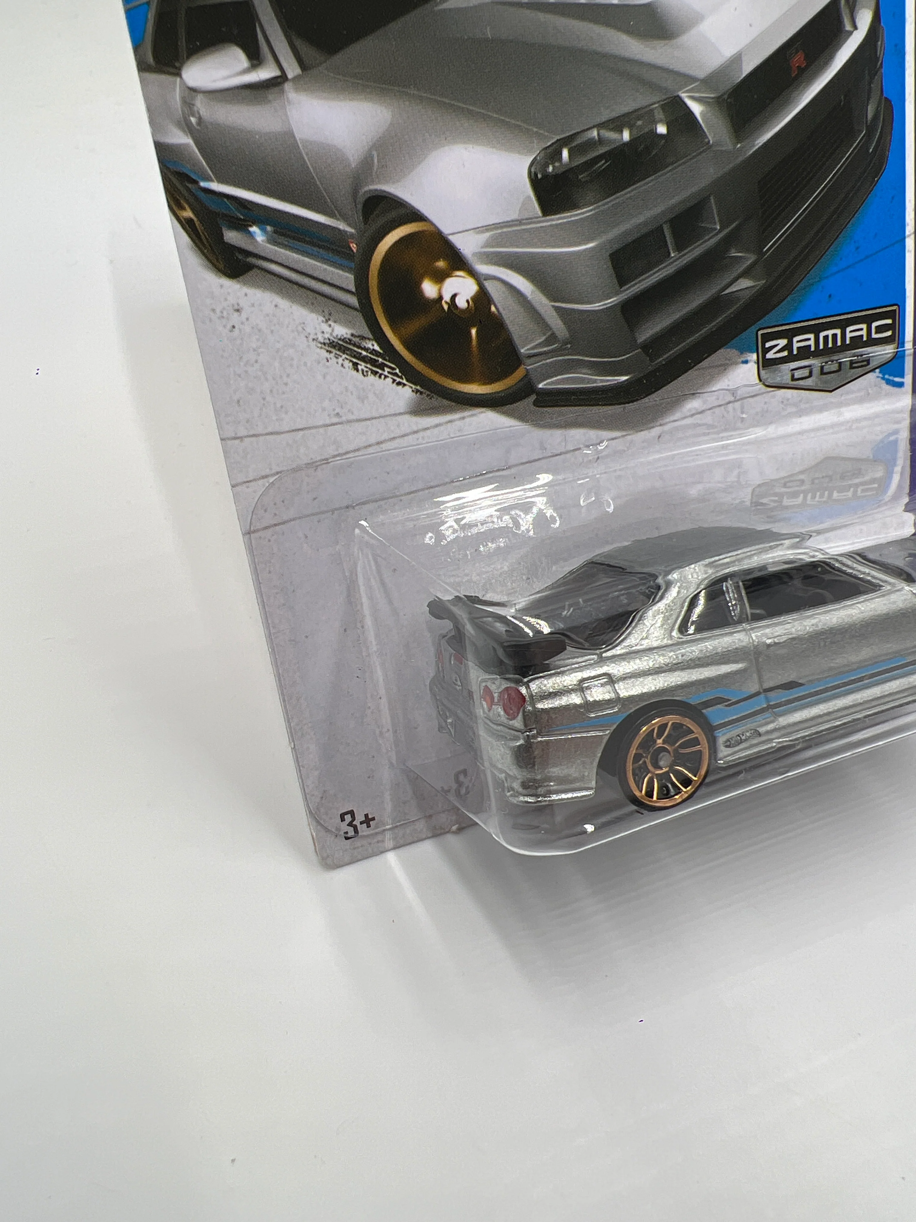 2013 Hot Wheels Walmart Exclusive Zamac 006 #158 Nissan Skyline GT-R R34 W/Protector - Image 4