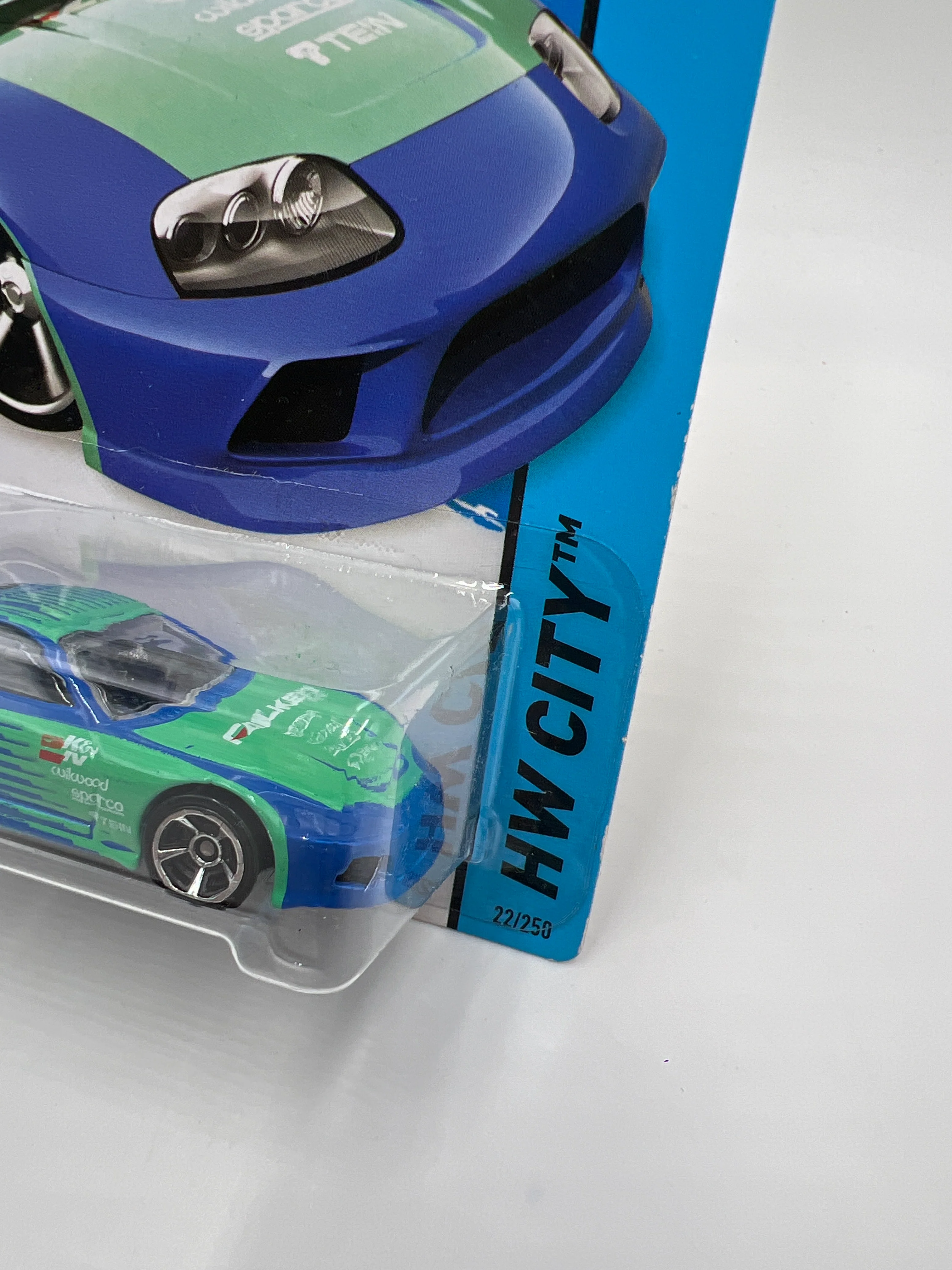 2014 Hot Wheels City #22 Toyota Supra Falken Blue/Green W/Protector - Image 3