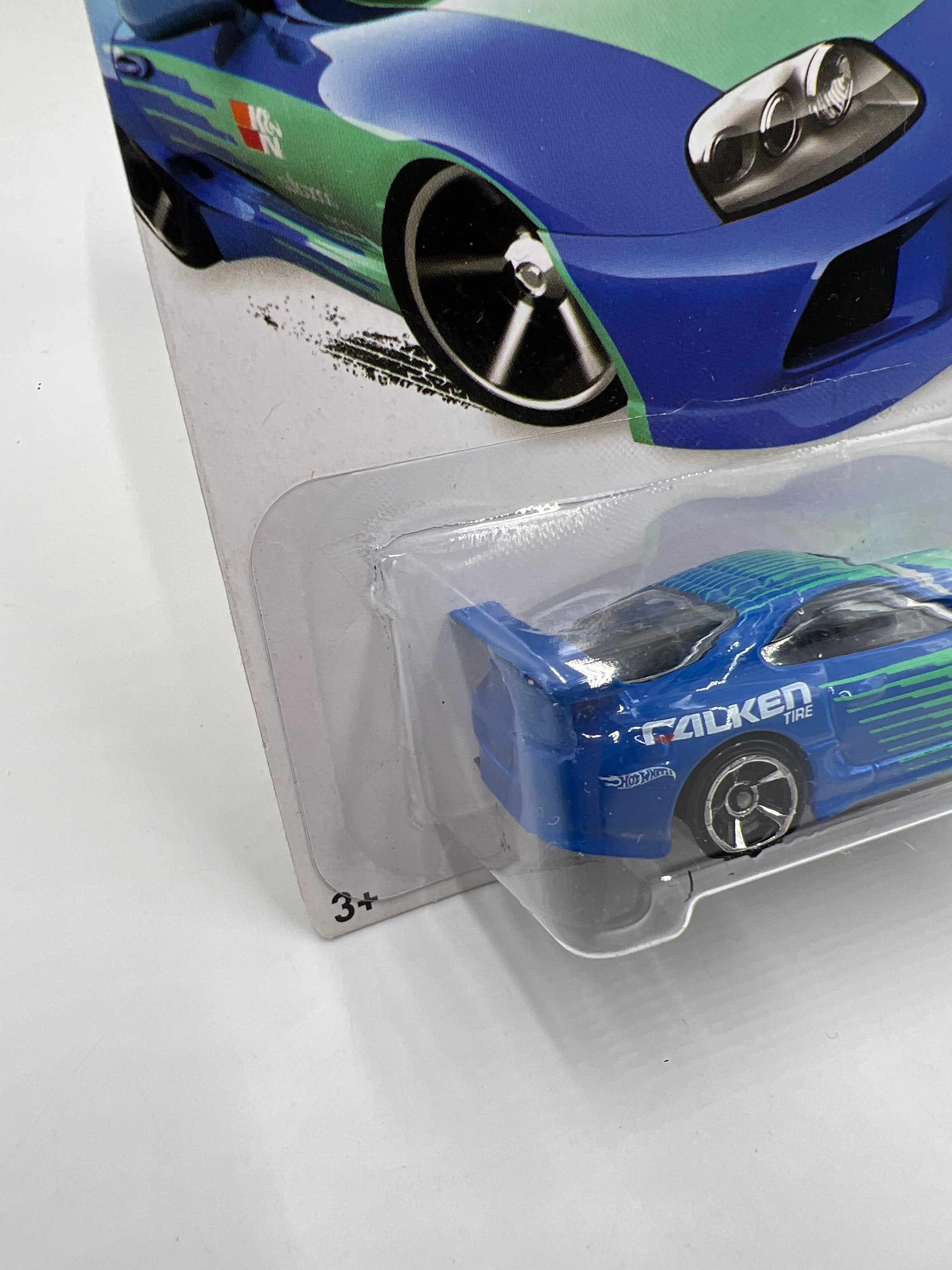 2014 Hot Wheels City #22 Toyota Supra Falken Blue/Green W/Protector - Image 4