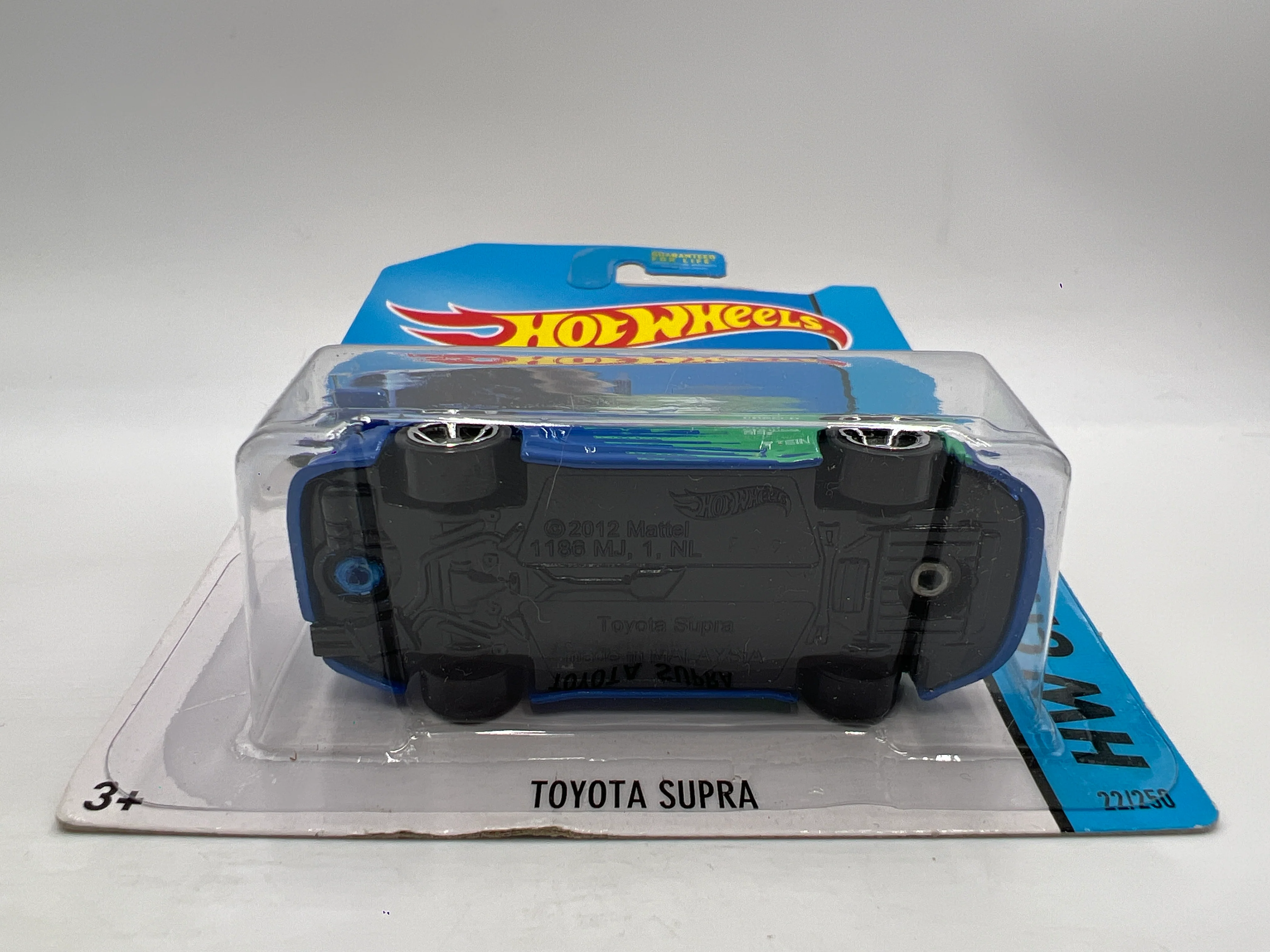 2014 Hot Wheels City #22 Toyota Supra Falken Blue/Green W/Protector - Image 5