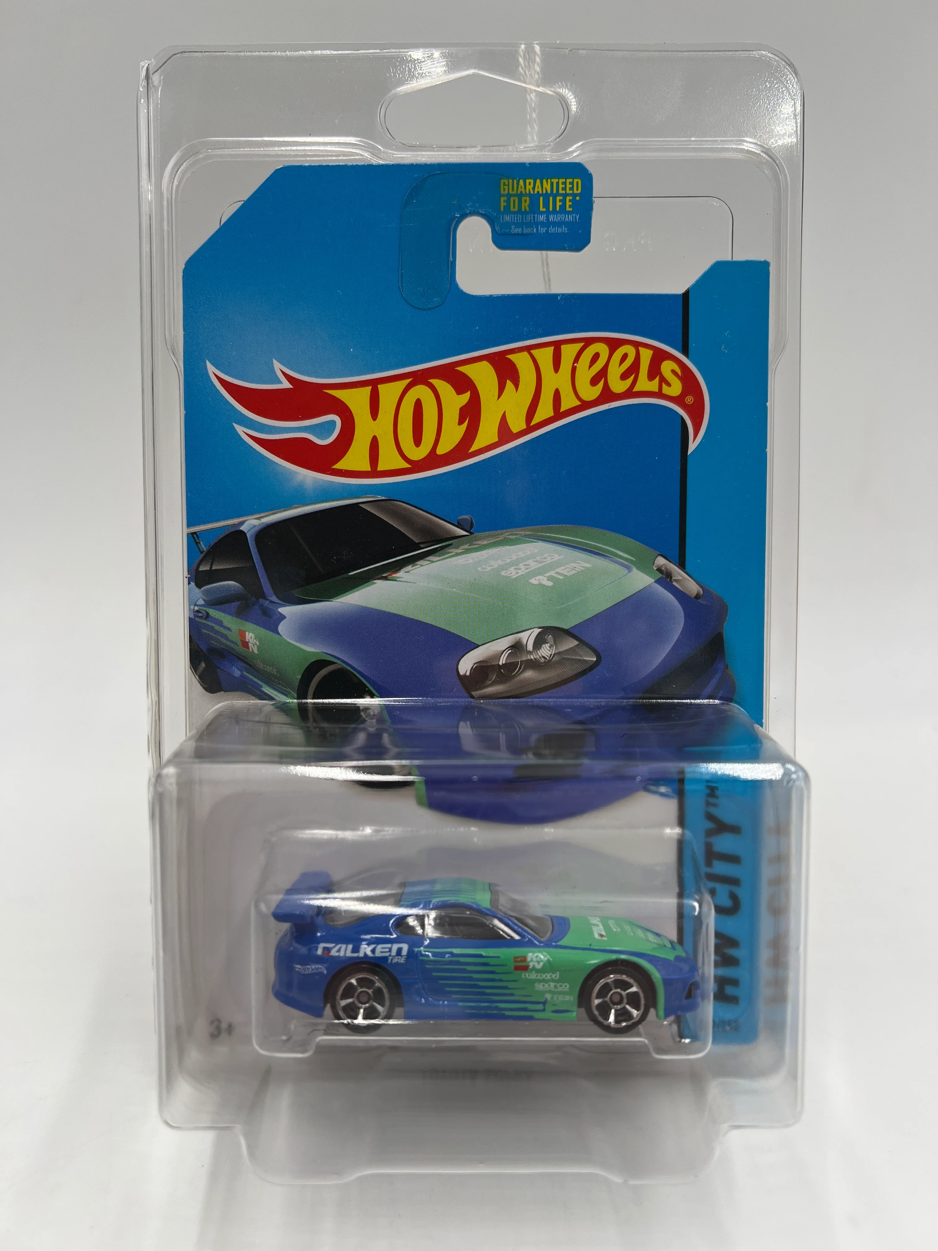 2014 Hot Wheels City #22 Toyota Supra Falken Blue/Green W/Protector - Image 7