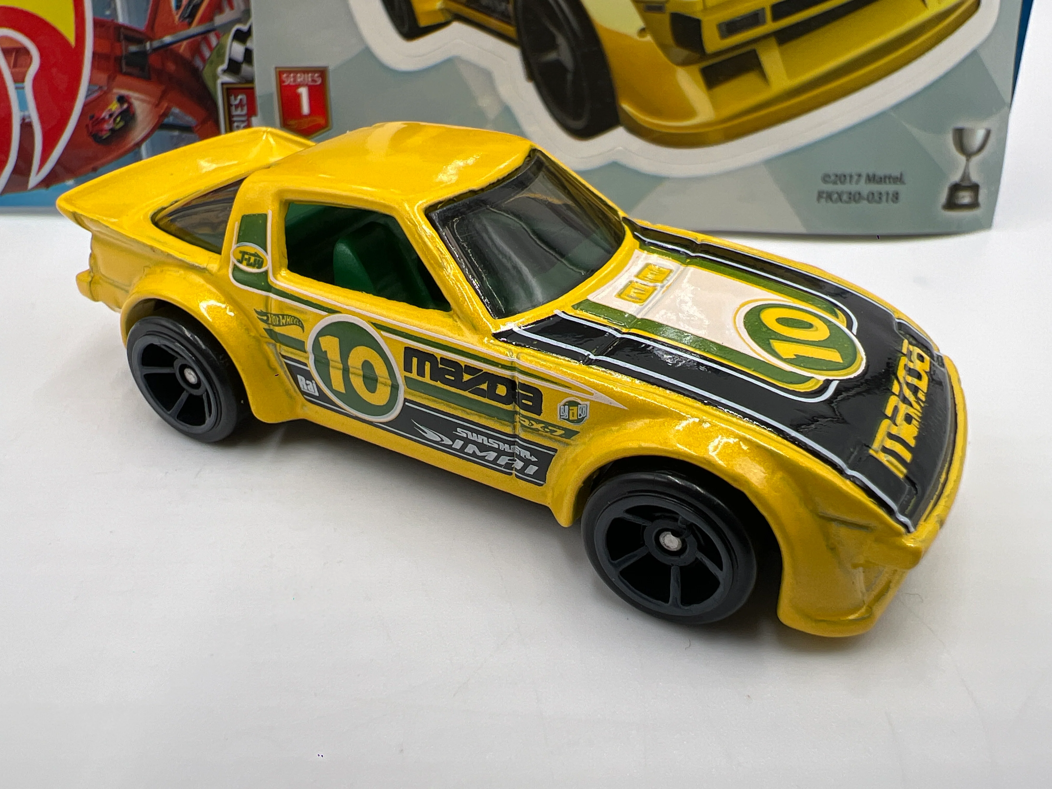 2018 Hot Wheels Mystery Models Series 1 #10 CHASE Mazda RX-7 Yellow - Image 2