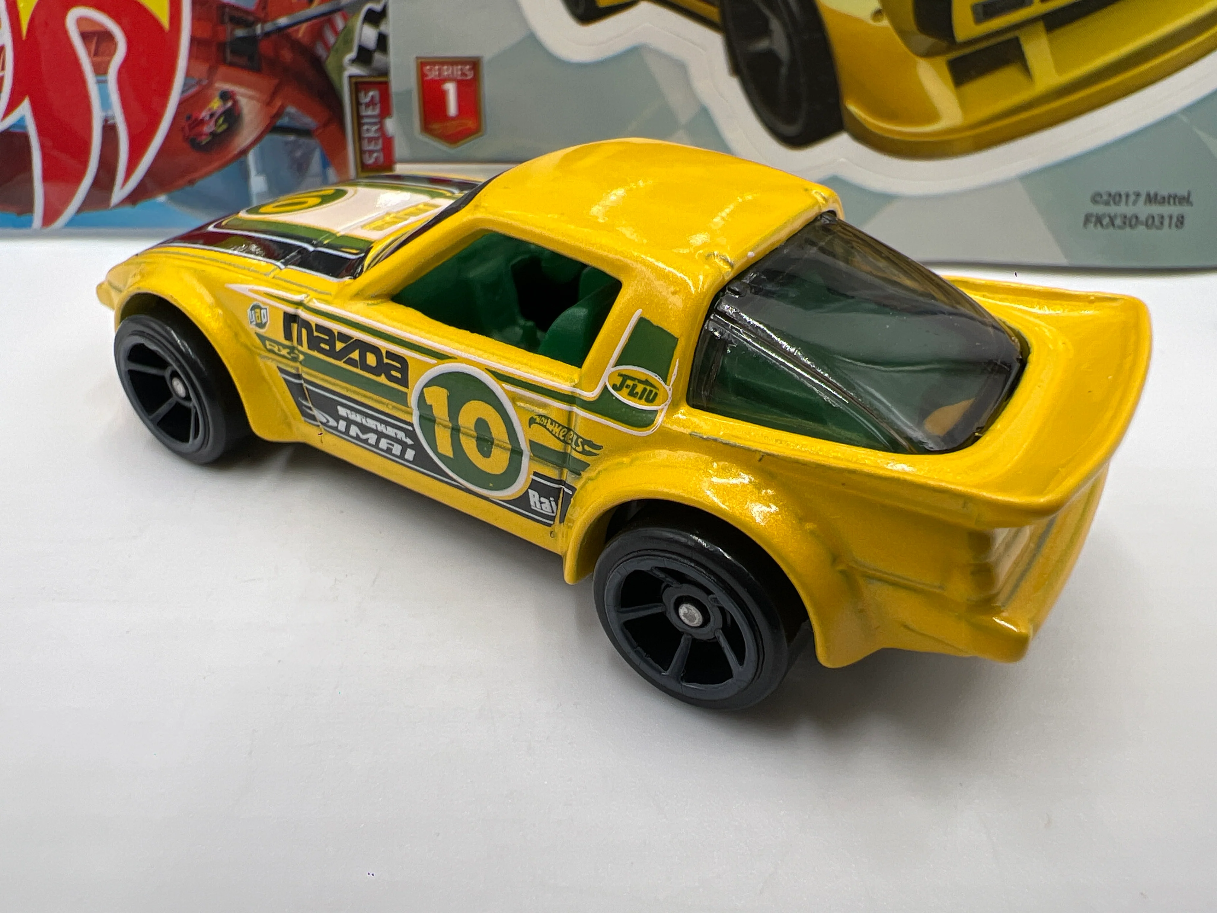 2018 Hot Wheels Mystery Models Series 1 #10 CHASE Mazda RX-7 Yellow - Image 3