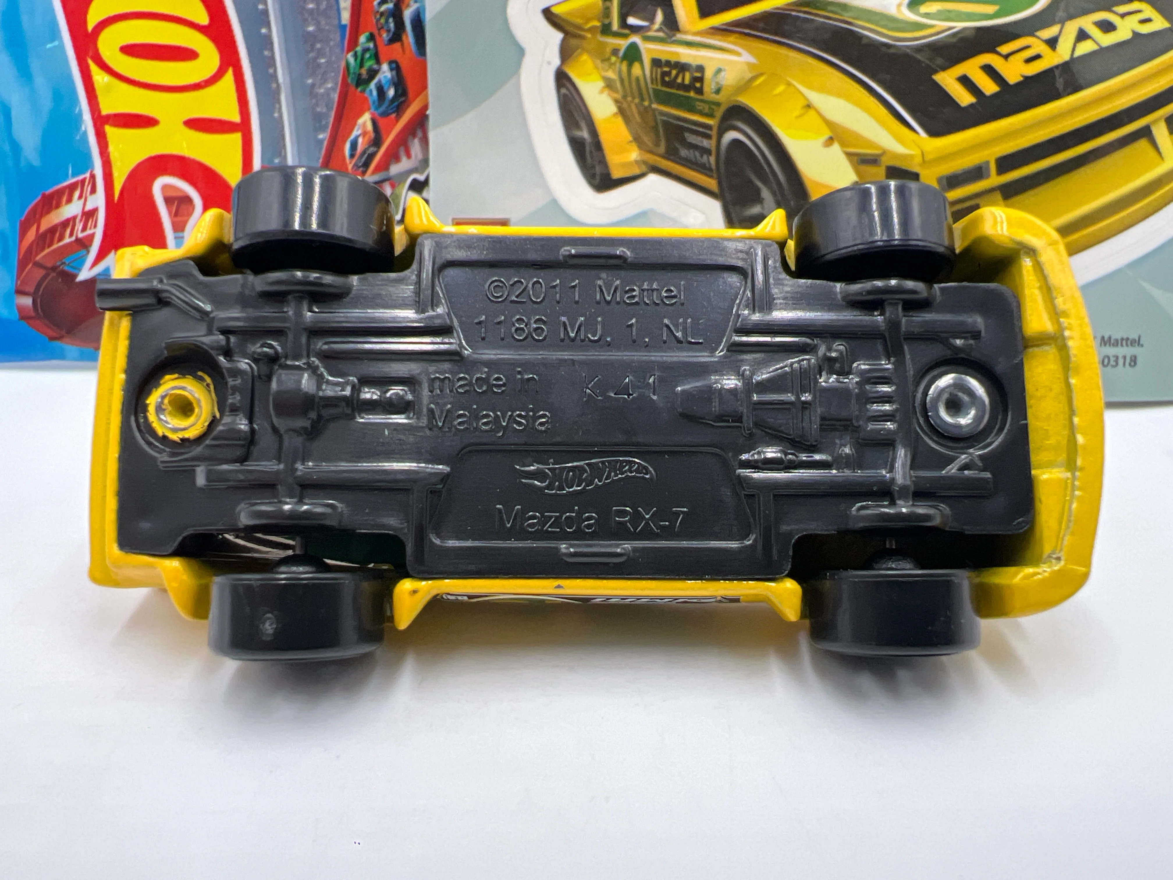 2018 Hot Wheels Mystery Models Series 1 #10 CHASE Mazda RX-7 Yellow - Image 6