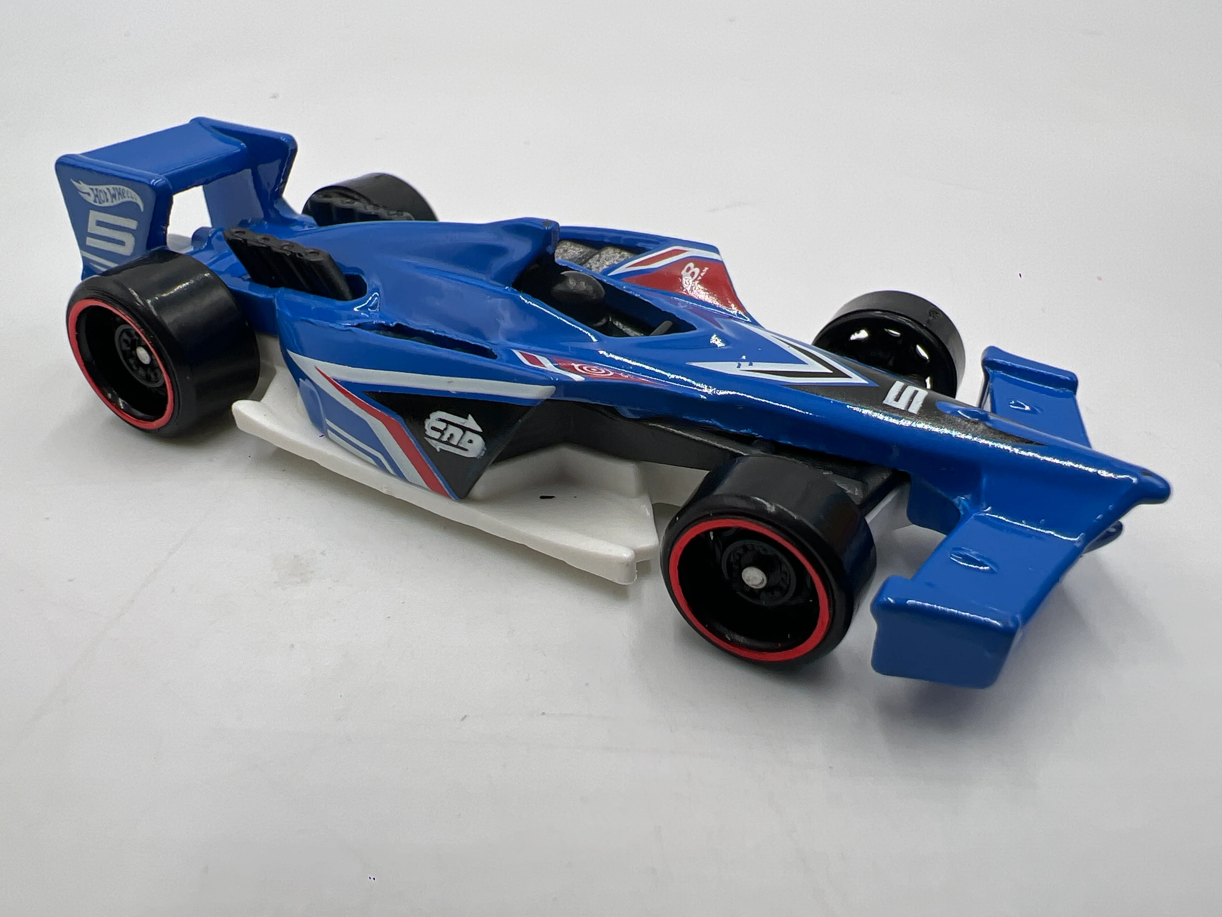 2021 Hot Wheels Mystery Models Series 2 #5 Winning Formula Blue - Image 2