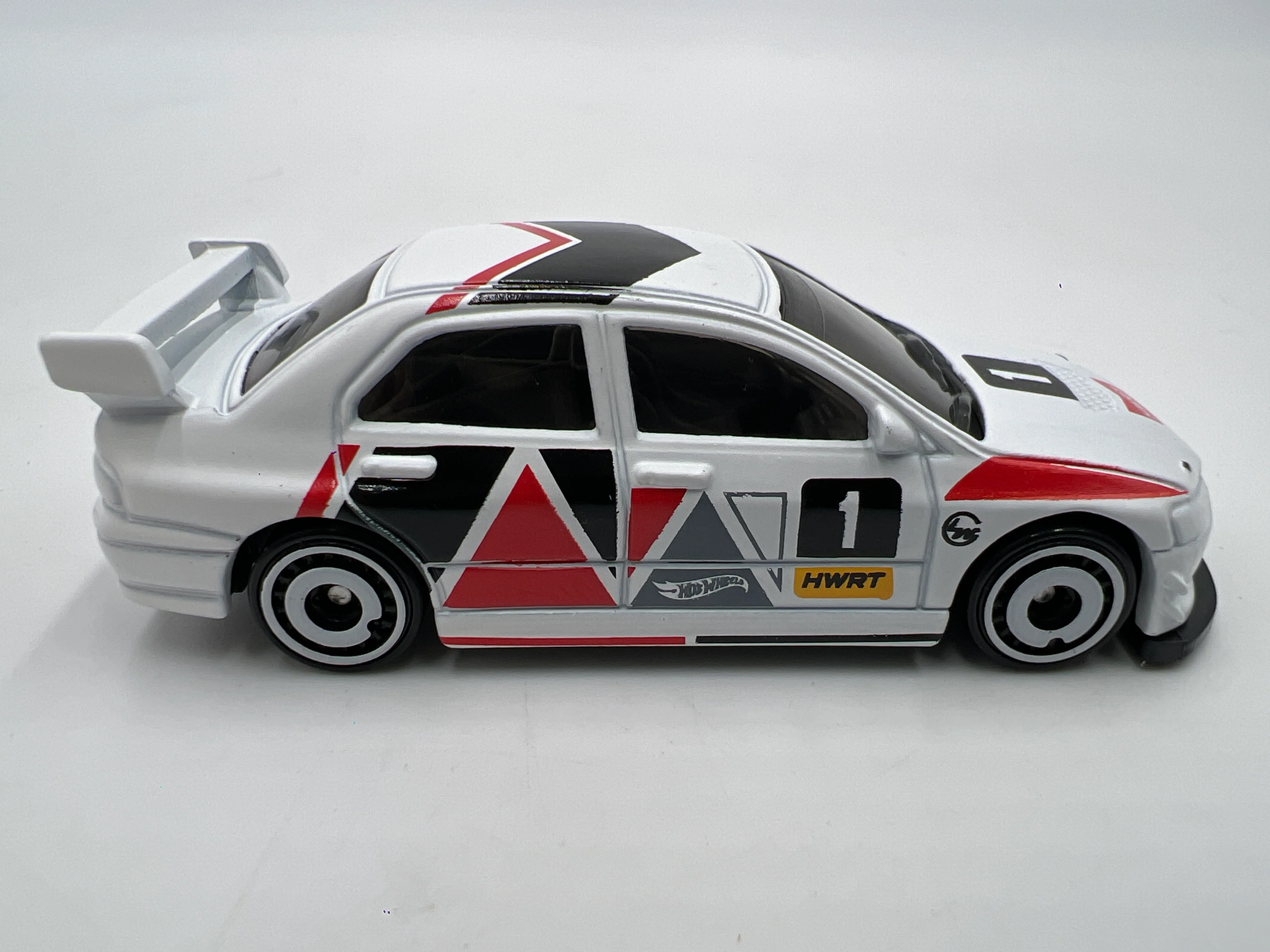 2024 Hot Wheels Mystery Models Series 1 #1 Chase Mitsubishi Lancer Evolution ix White - Image 4
