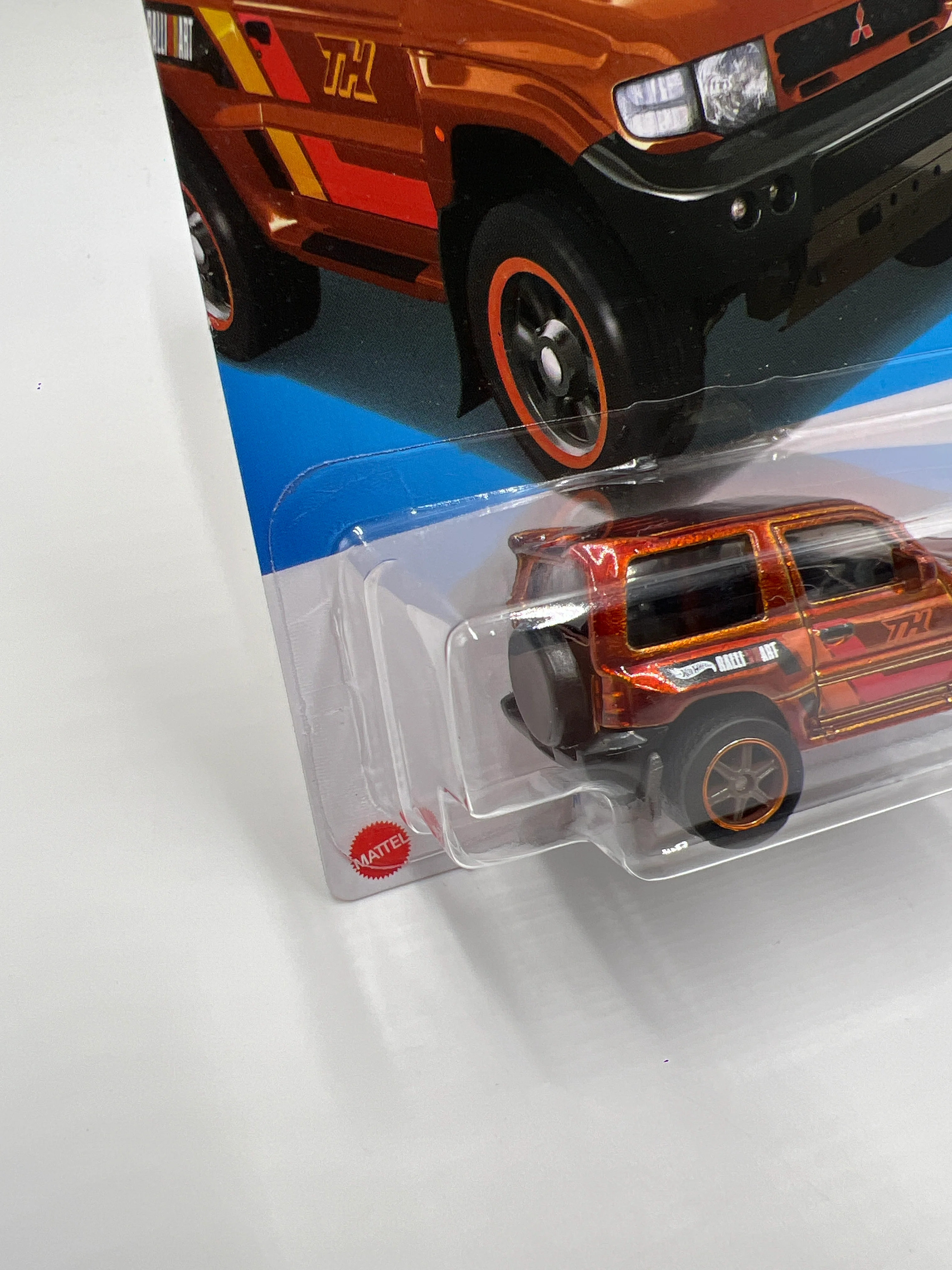 2024 Hot Wheels Super Treasure Hunt #169 Mitsubishi Pajero Evolution Orange W/Protector - Image 4