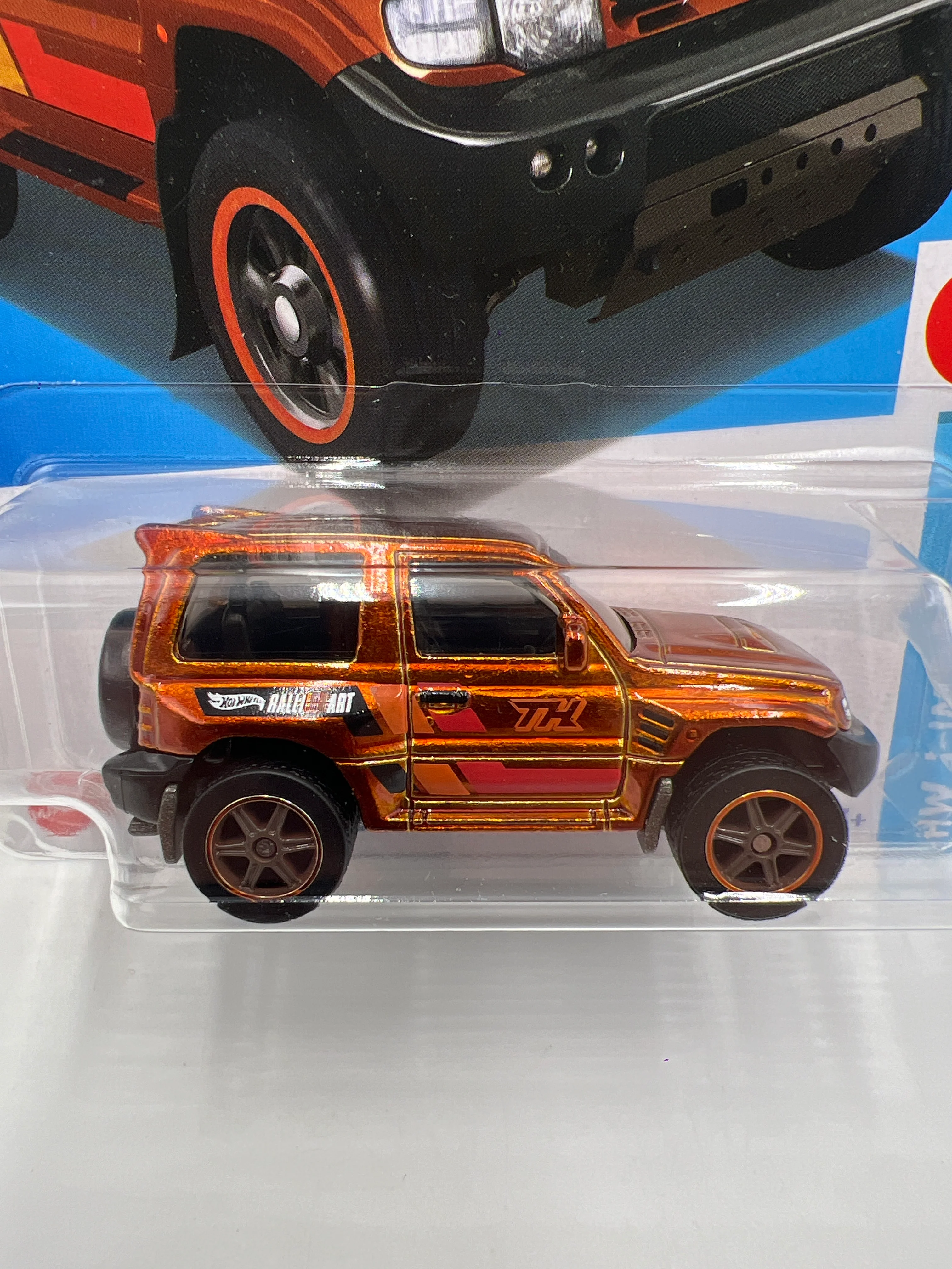 2024 Hot Wheels Super Treasure Hunt #169 Mitsubishi Pajero Evolution Orange W/Protector - Image 2