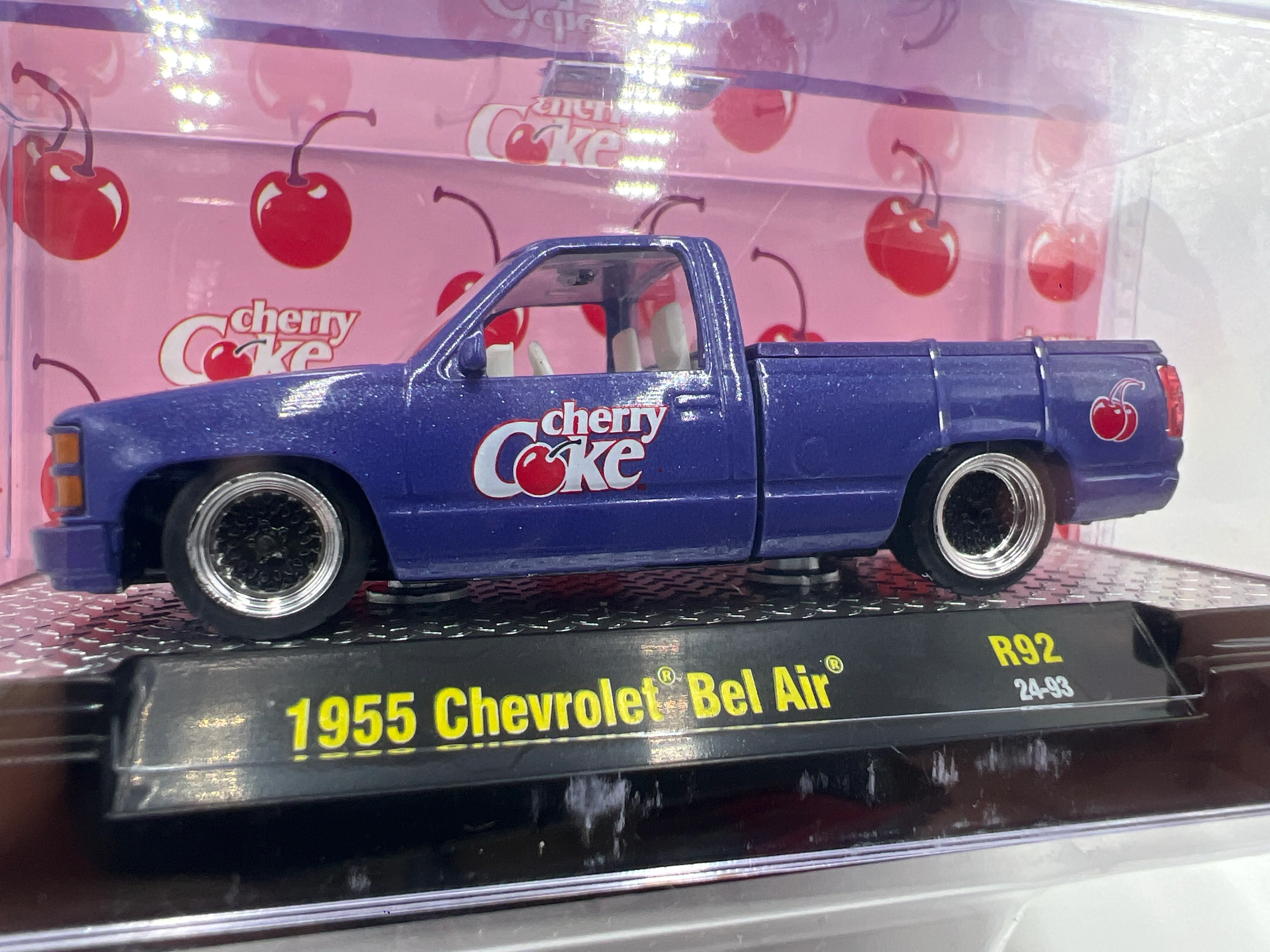 2024 M2 Machines Cherry Coke 1988 GMC Sierra 1500 Custom Purple Base Error (1955 Chevrolet Bel Air) - Image 3