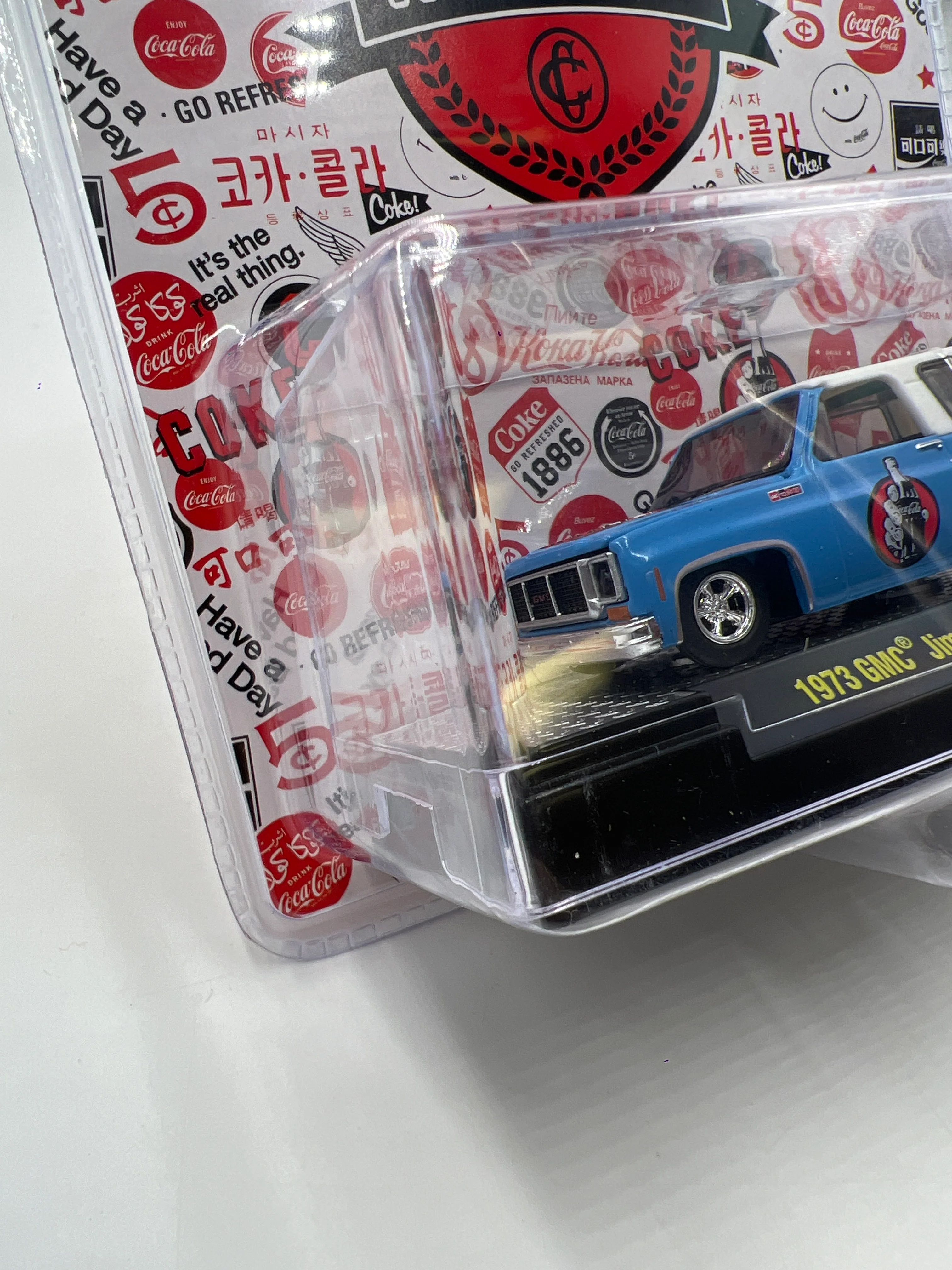 2024 M2 Machines Coca Cola 1973 GMC Jimmy Sierra Blue A46 204E - Image 5