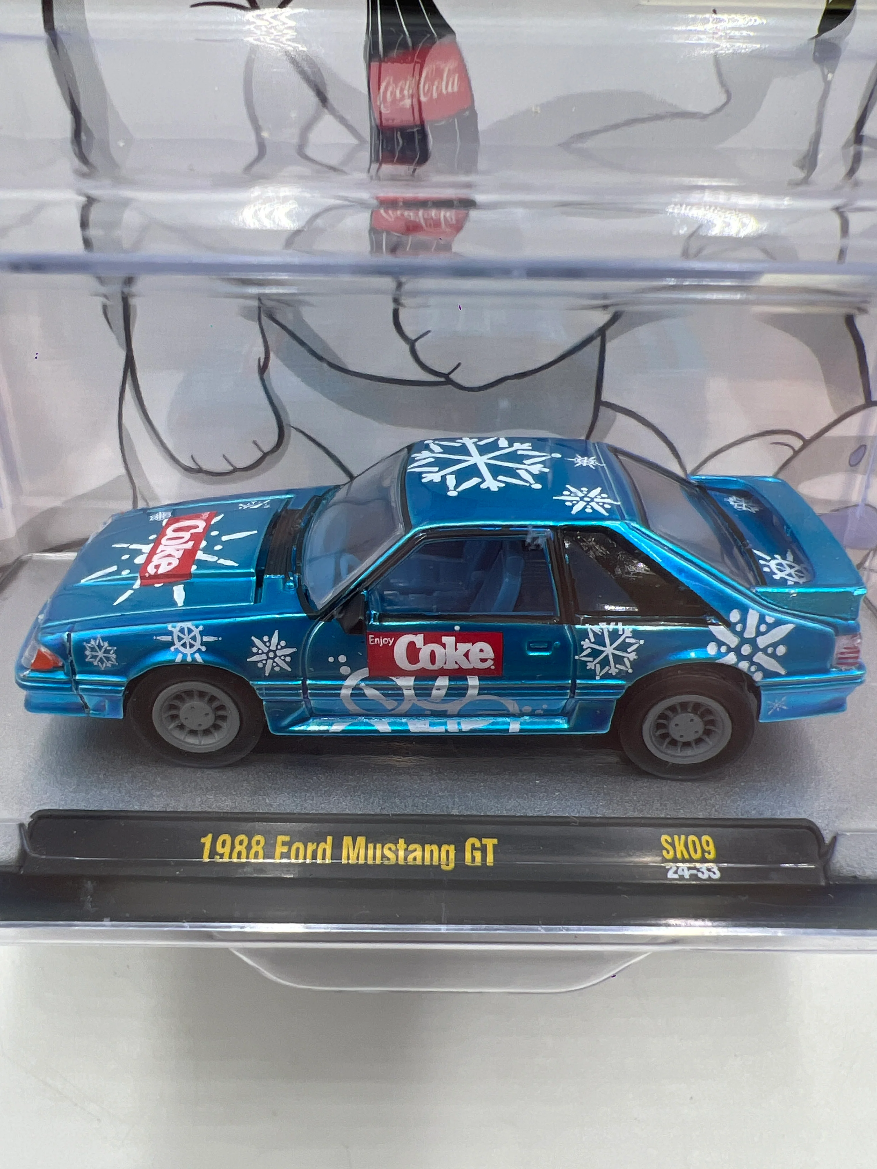 2024 M2 Machines Holiday Coca Cola 1988 Ford Mustang GT Blue SK09 - Image 3