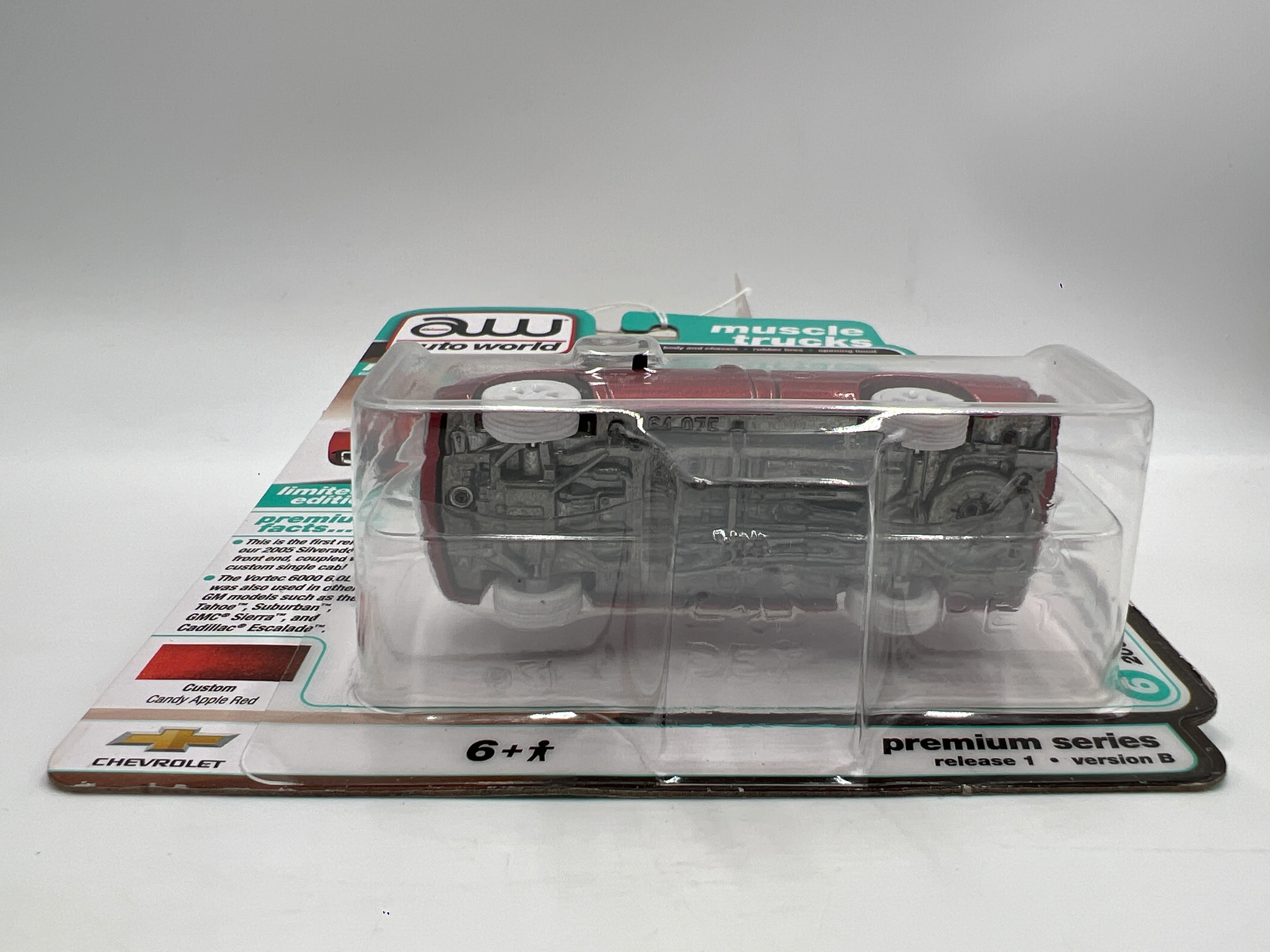2025 Auto World Muscle Trucks CHASE Release 1 Version B 2005 Chevy Silverado SS Custom Ultra Red Cateye #2 - Image 6