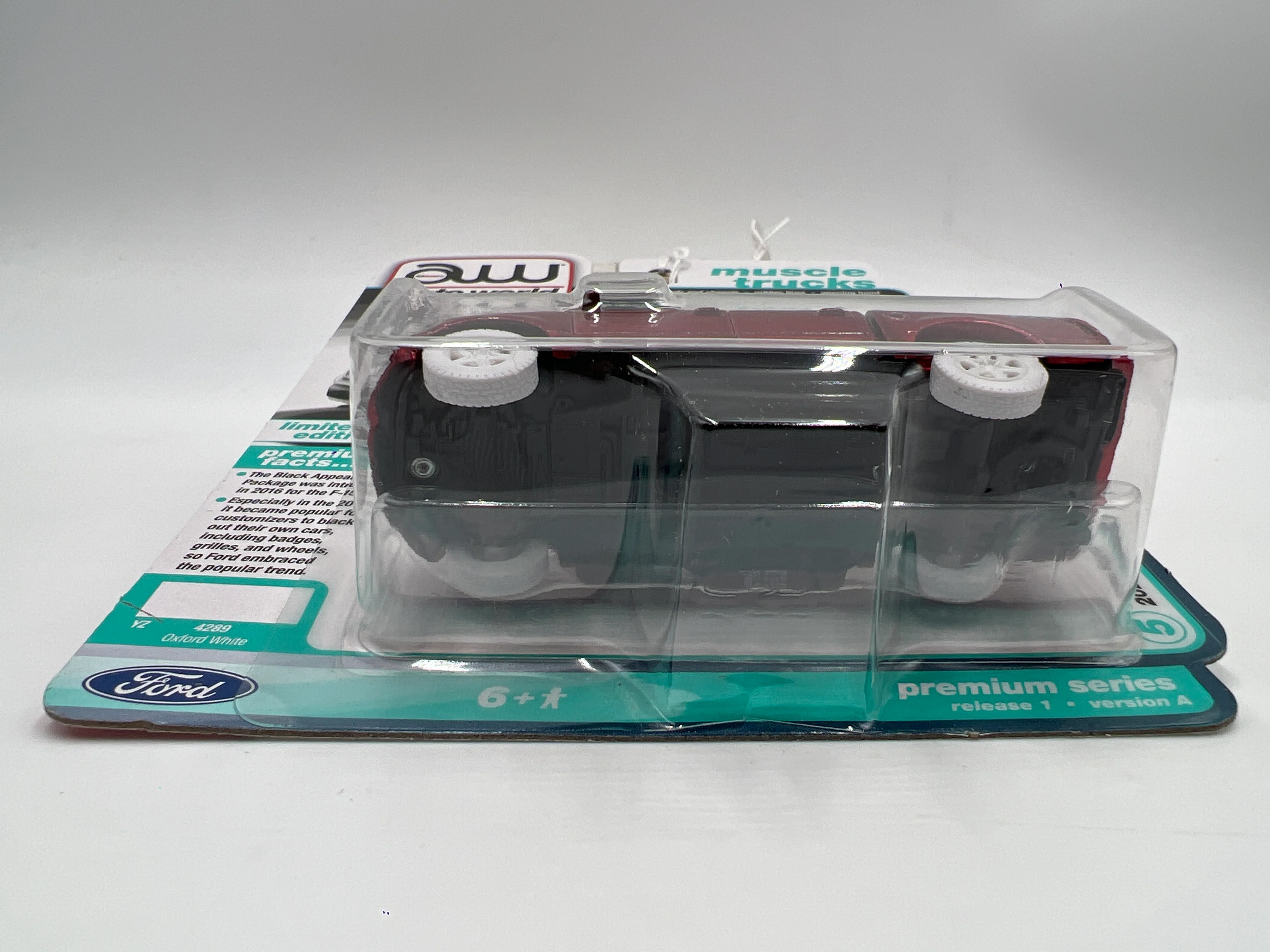 2025 Auto World Muscle Trucks CHASE Release 1 Version A 2020 Ford F-150 Black Appearance Package Ultra Red - Image 6