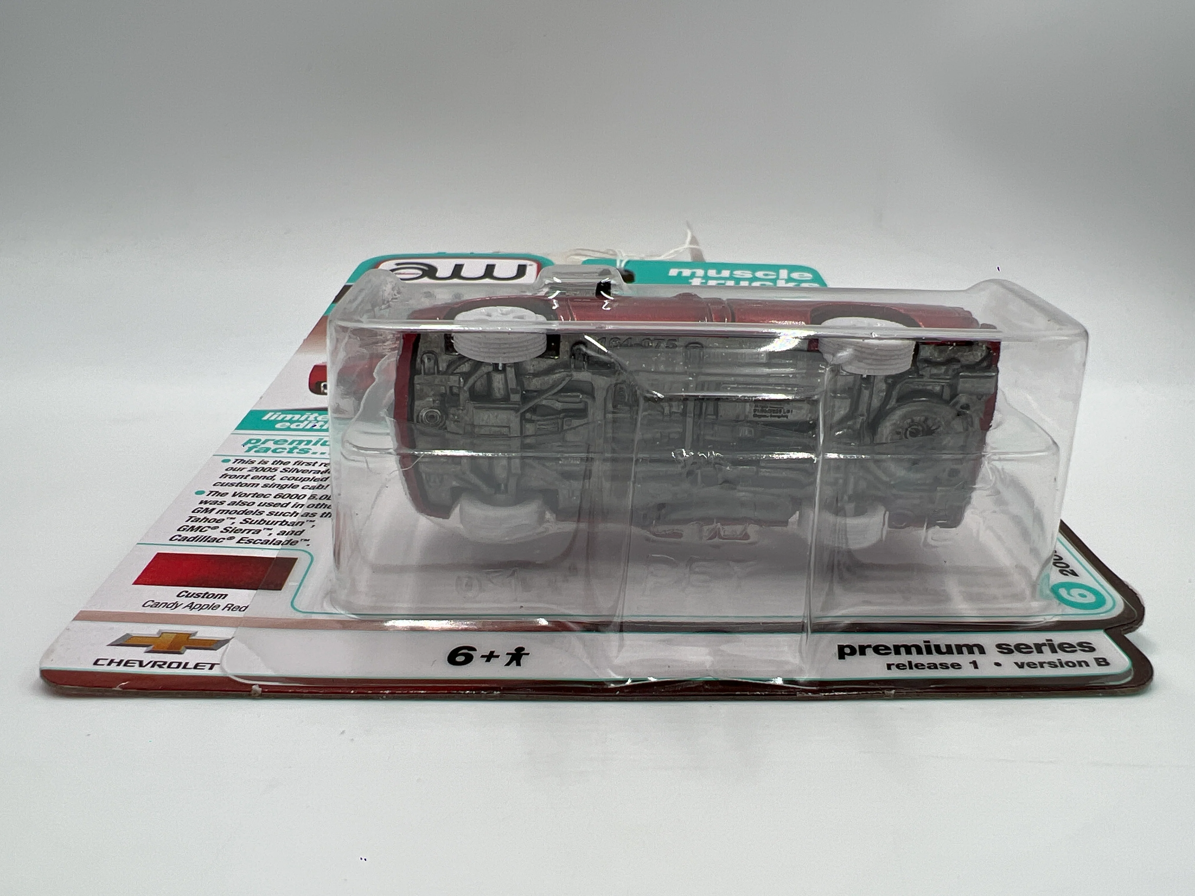 2025 Auto World Muscle Trucks CHASE Release 1 Version B 2005 Chevy Silverado SS Custom Ultra Red Cateye - Image 6