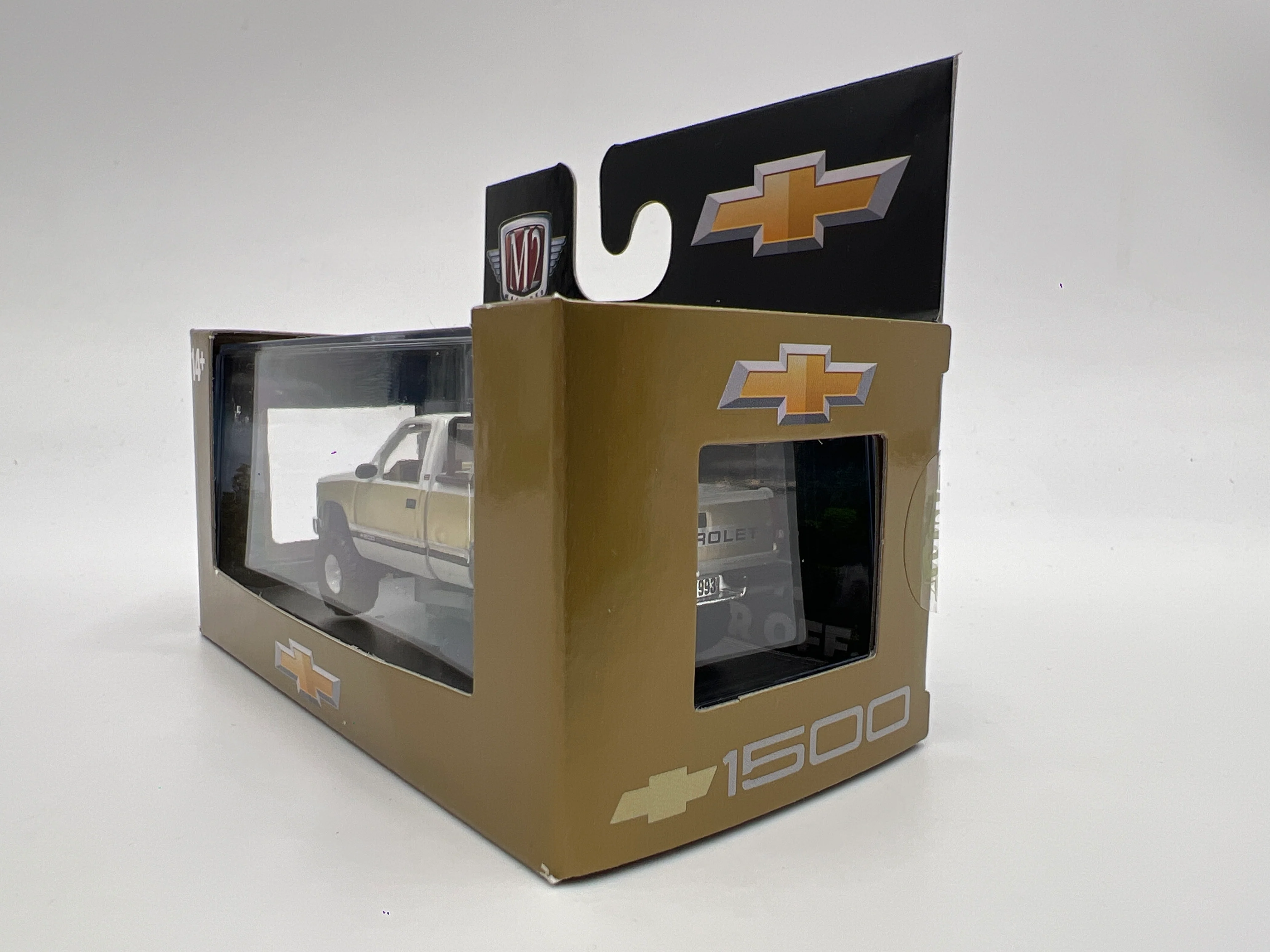 2025 M2 Machines 1993 Chevrolet Silverado 1500 4x4 White/Gold R90 - Image 4