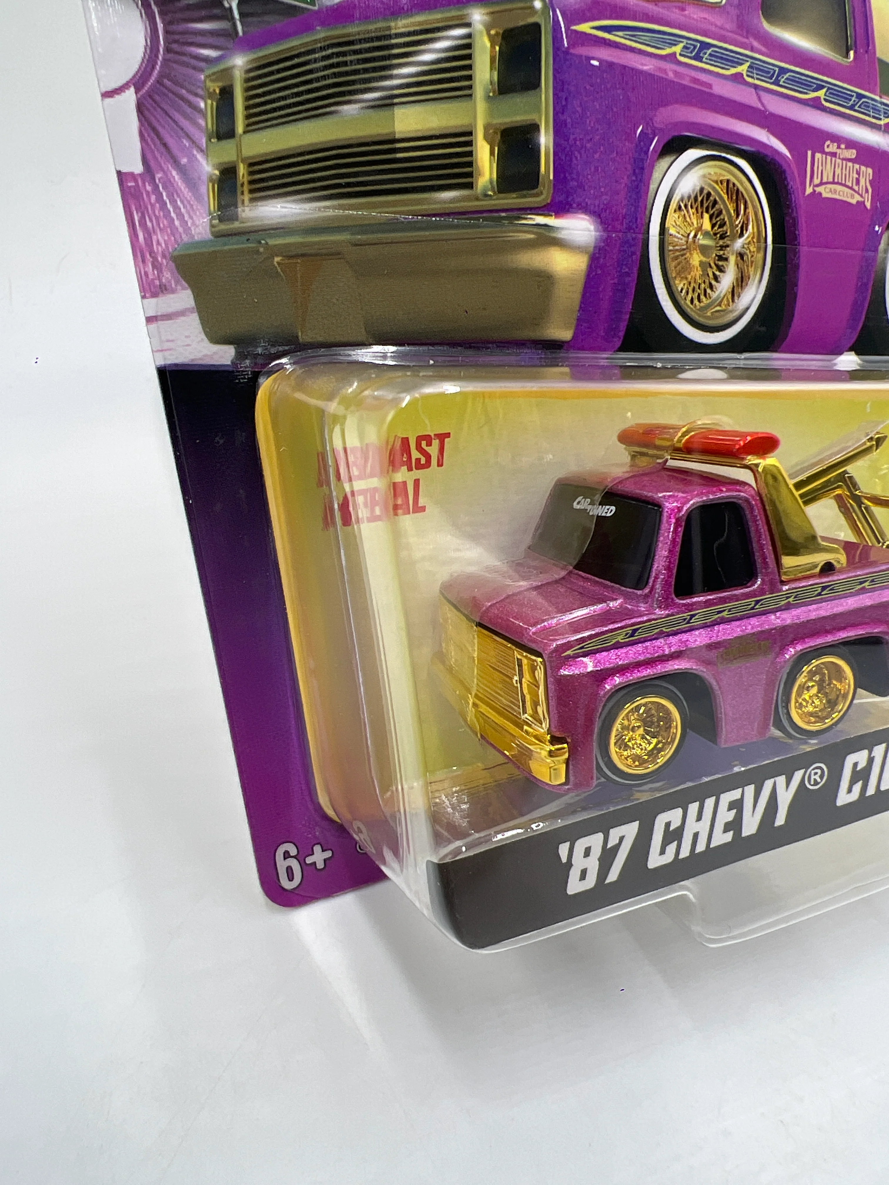 2025 MGA Car Tuned Series 8 #3 87 Chevy C10 Pink 183C - Image 4