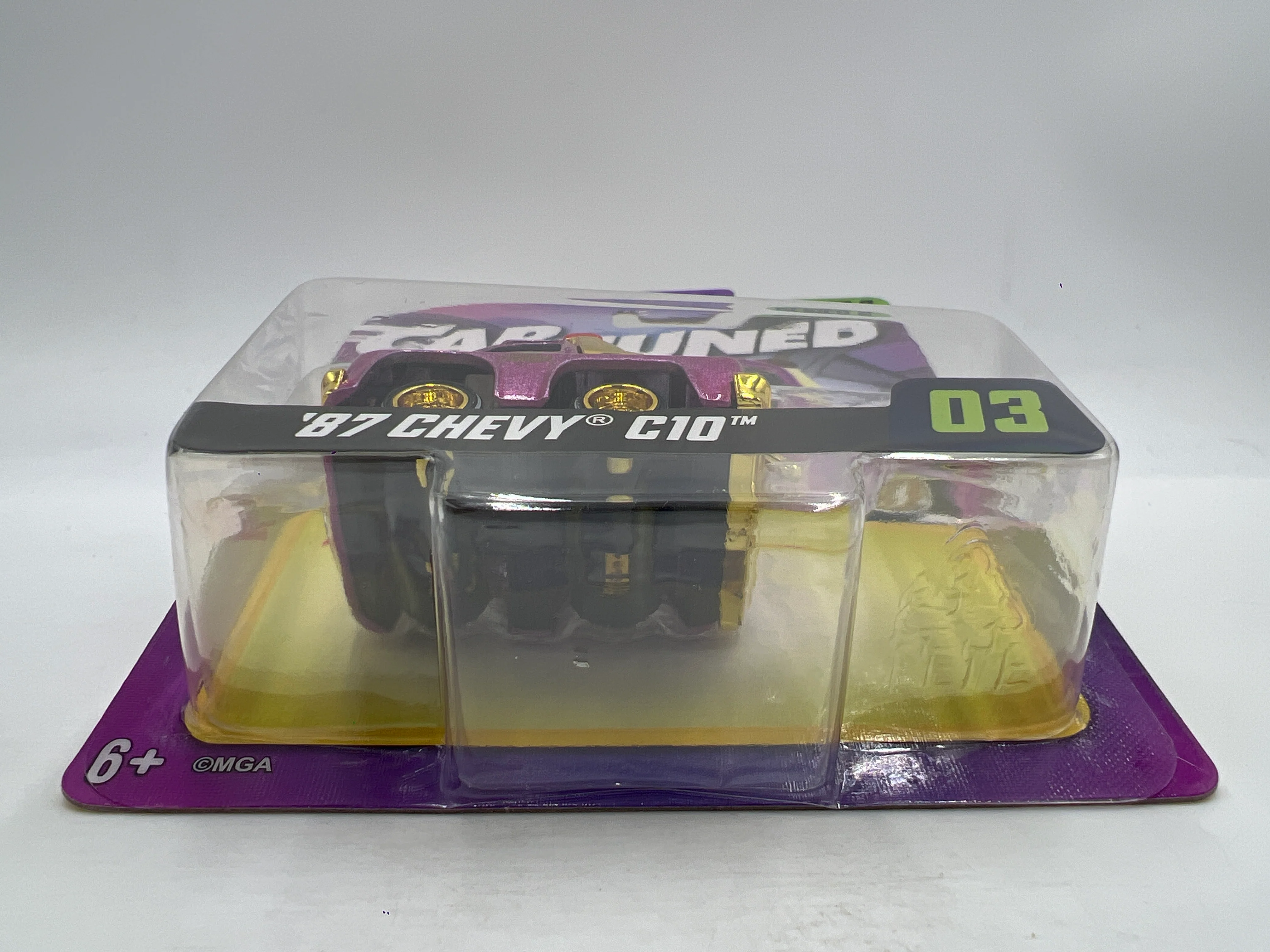 2025 MGA Car Tuned Series 8 #3 87 Chevy C10 Pink 183C - Image 5