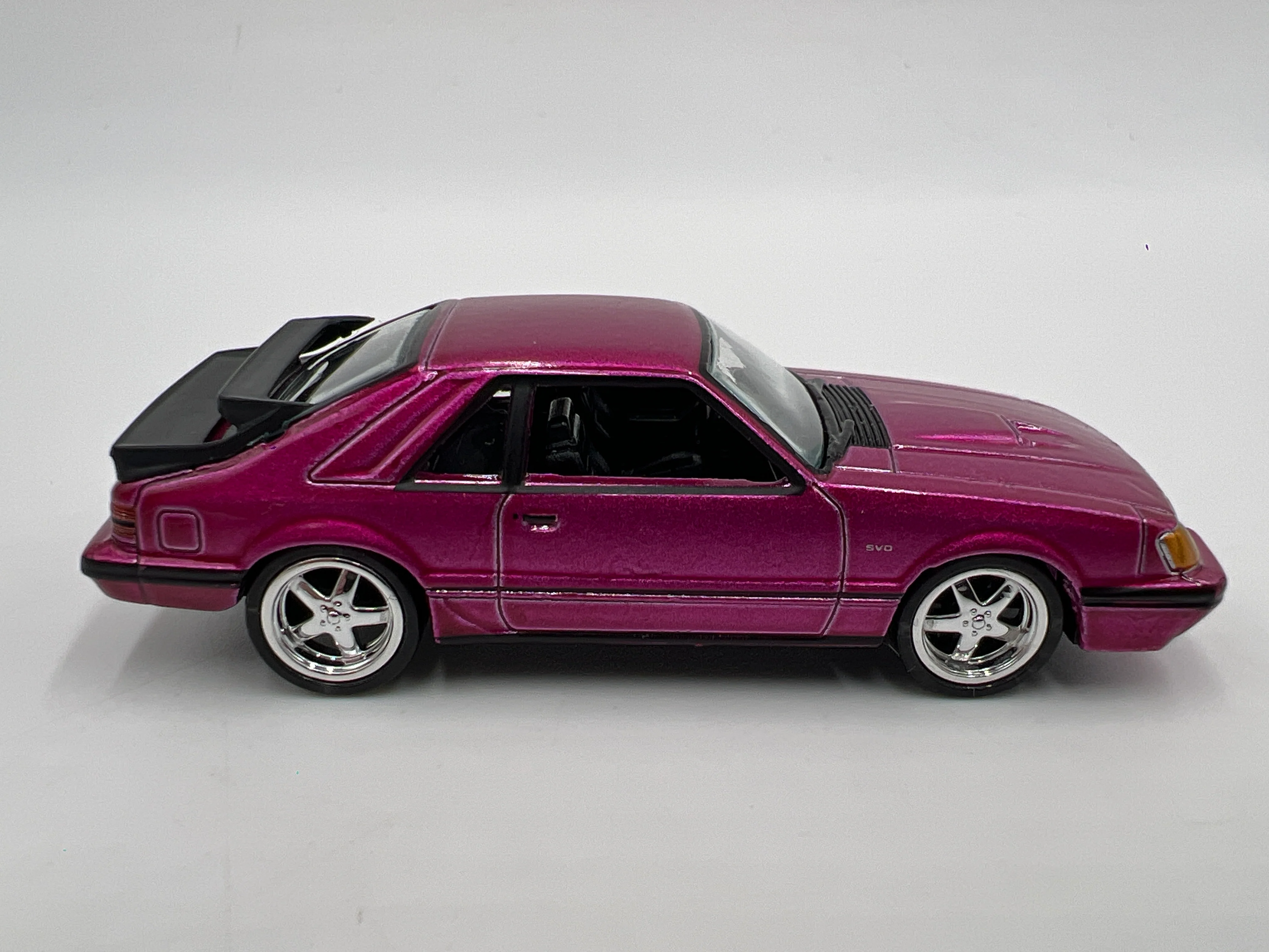 Auto World 1/64 Target Exclusive 1985 Ford Mustang SVO Pink Loose - Image 3