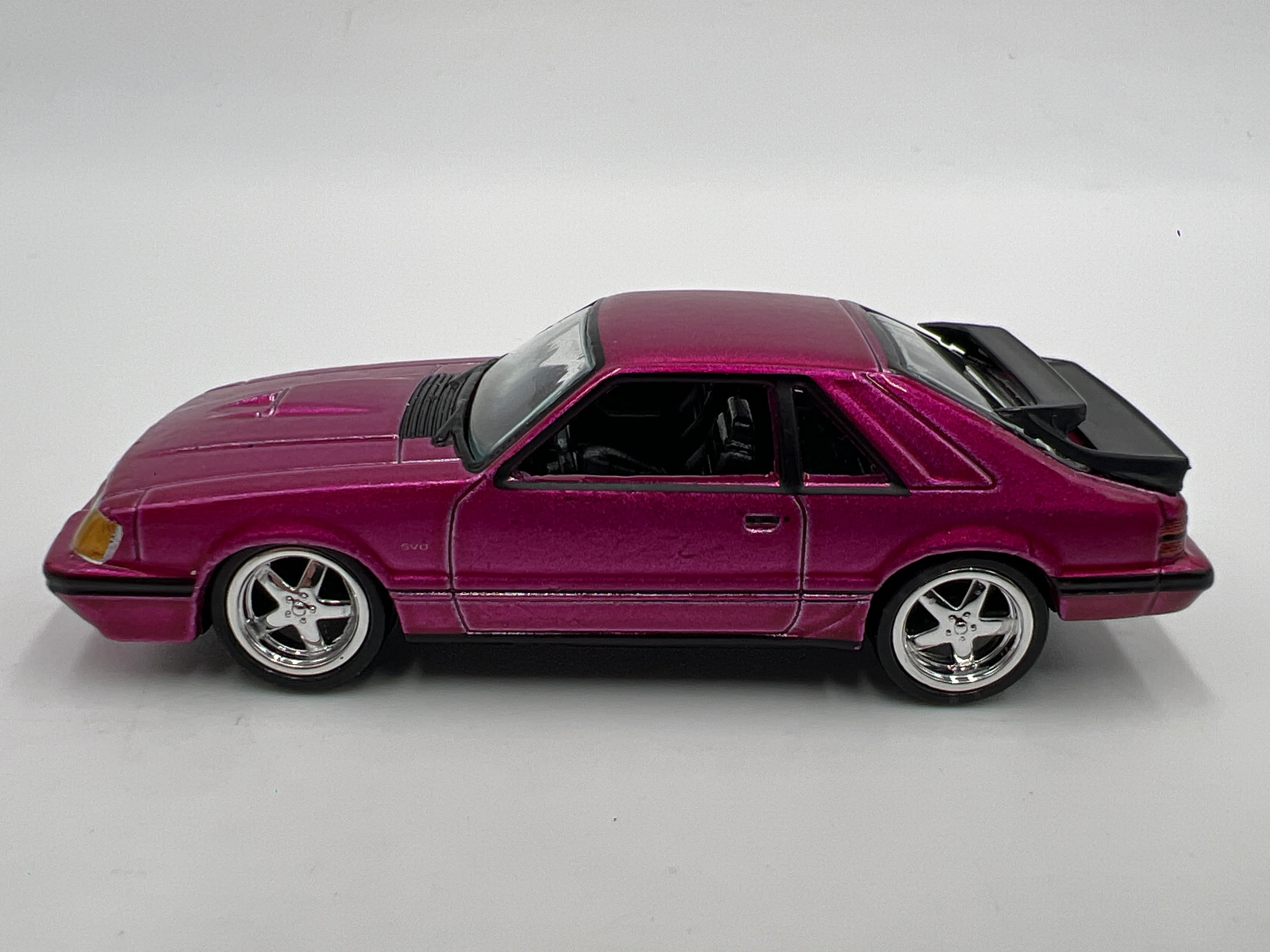 Auto World 1/64 Target Exclusive 1985 Ford Mustang SVO Pink Loose - Image 4