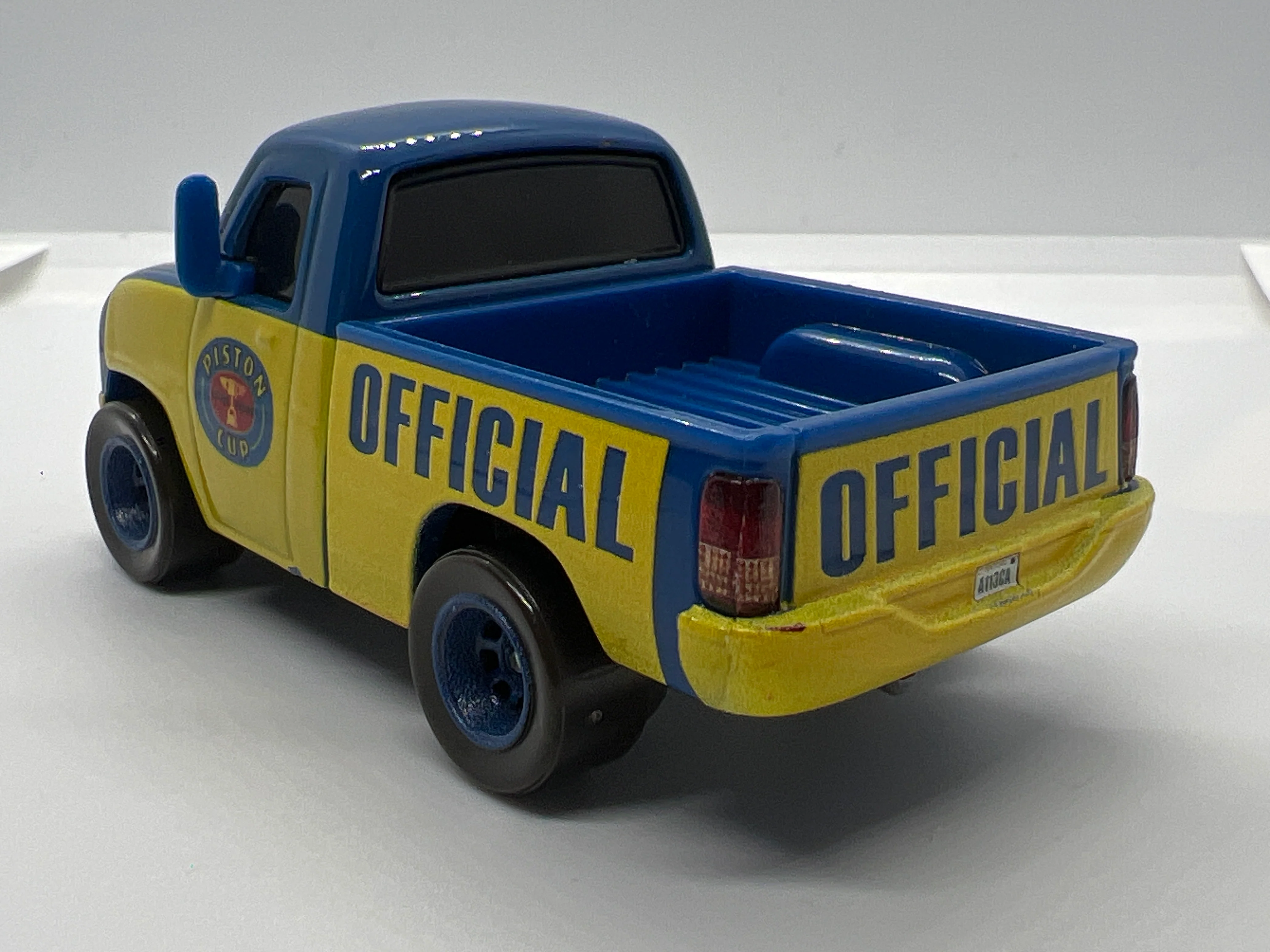 Disney Pixar Cars Piston Cup Race Tom Truck Blue/Yellow Loose - Image 2