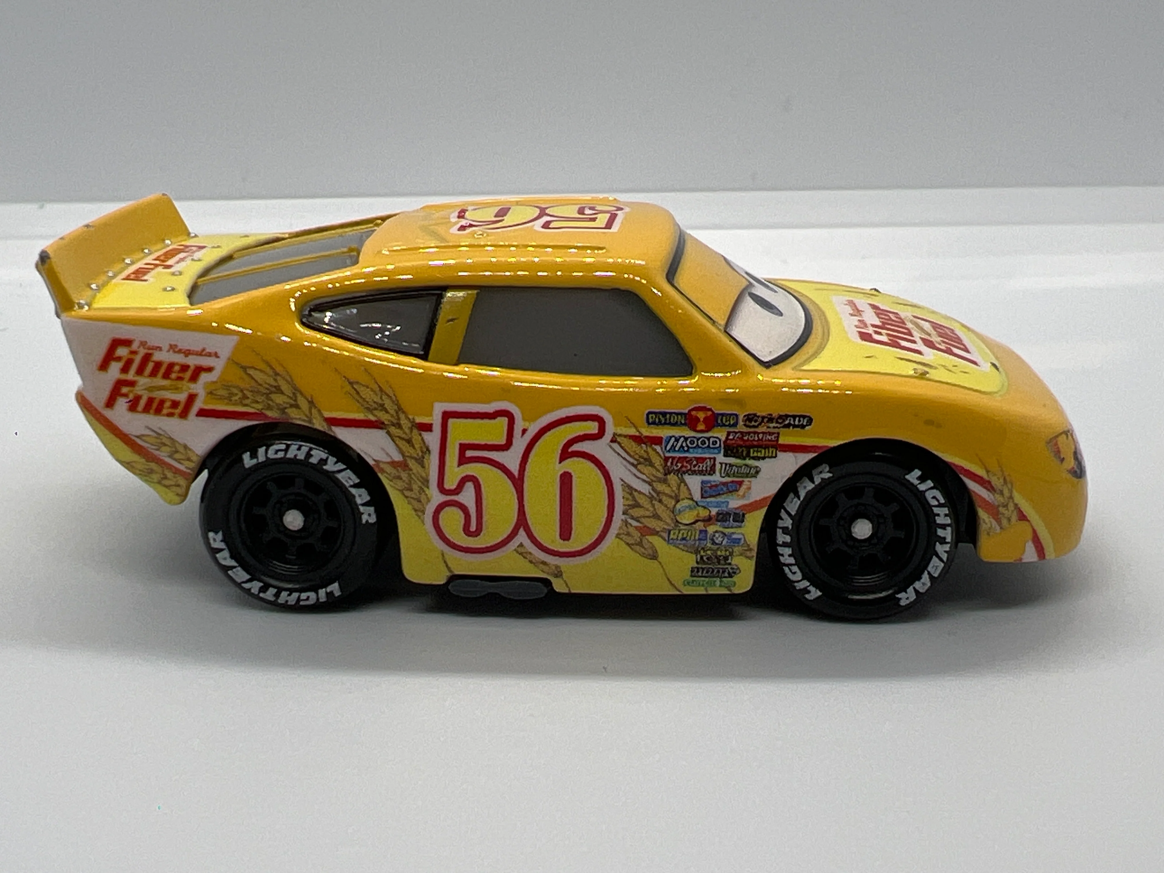 Disney Pixar Cars #42 Brusho Curber Fiber Fuel Yellow Loose - Image 3