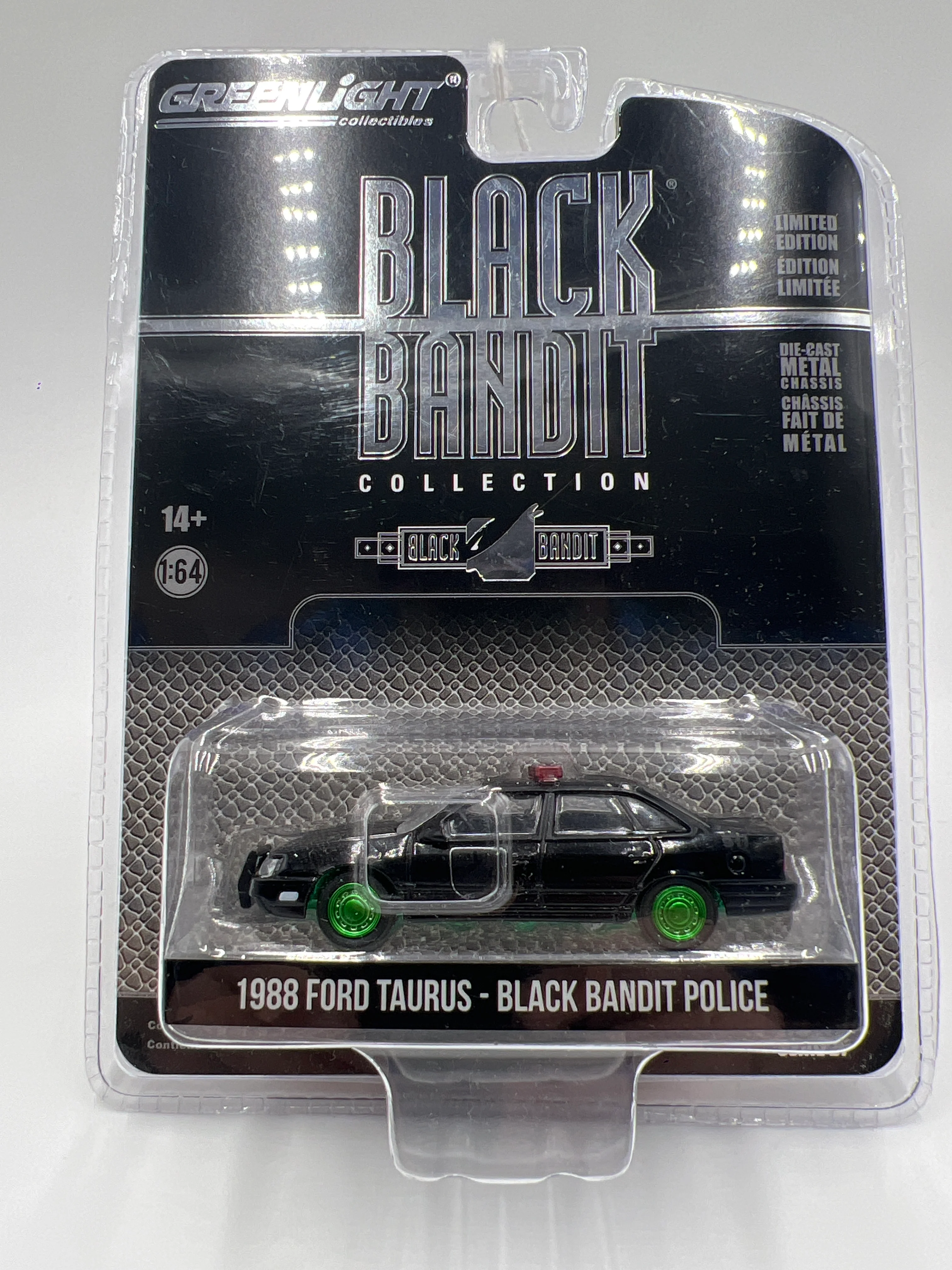 Greenlight Black Bandit Series 27 CHASE 1988 Ford Taurus Black Bandit Police - Image 2
