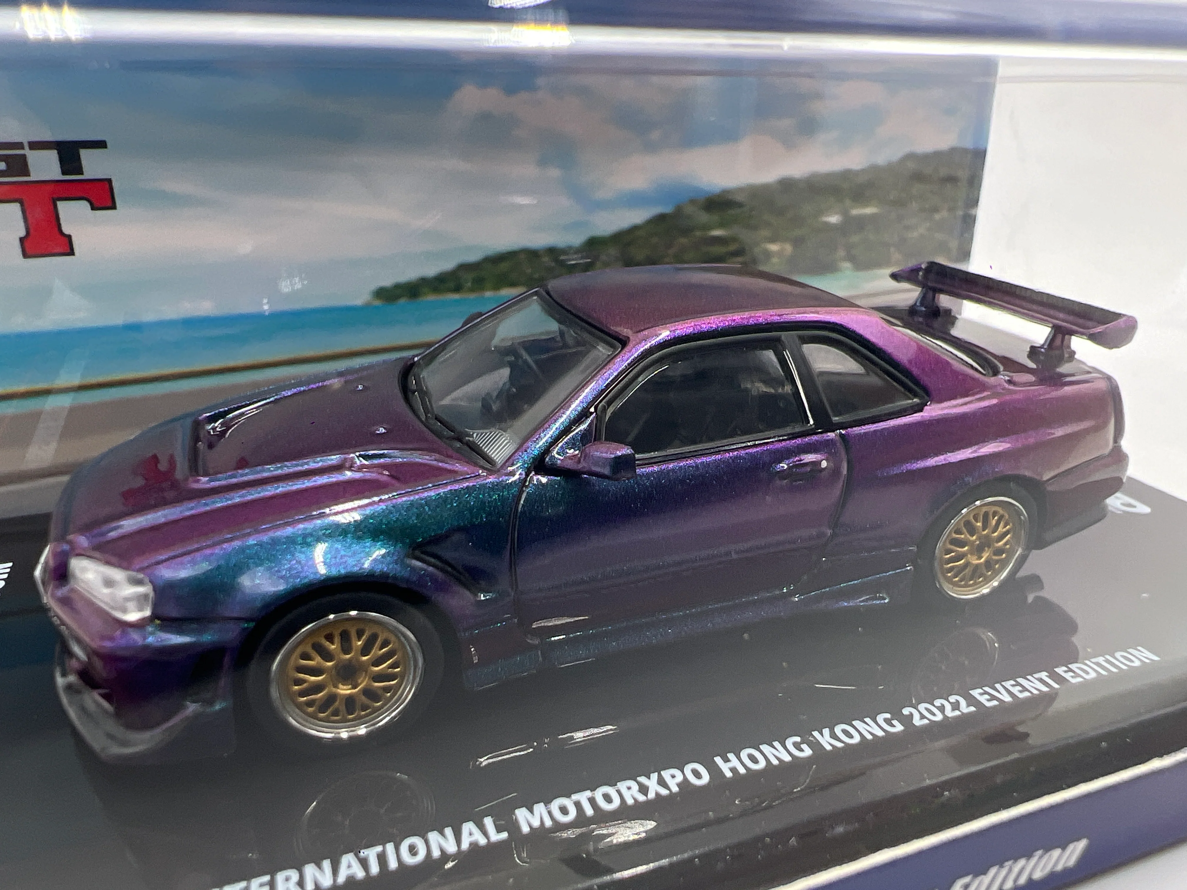 Inno64 International MotorXPO Hong Kong 2022 Event Edition Nissan Skyline R34 GT-T Chameleon - Image 2