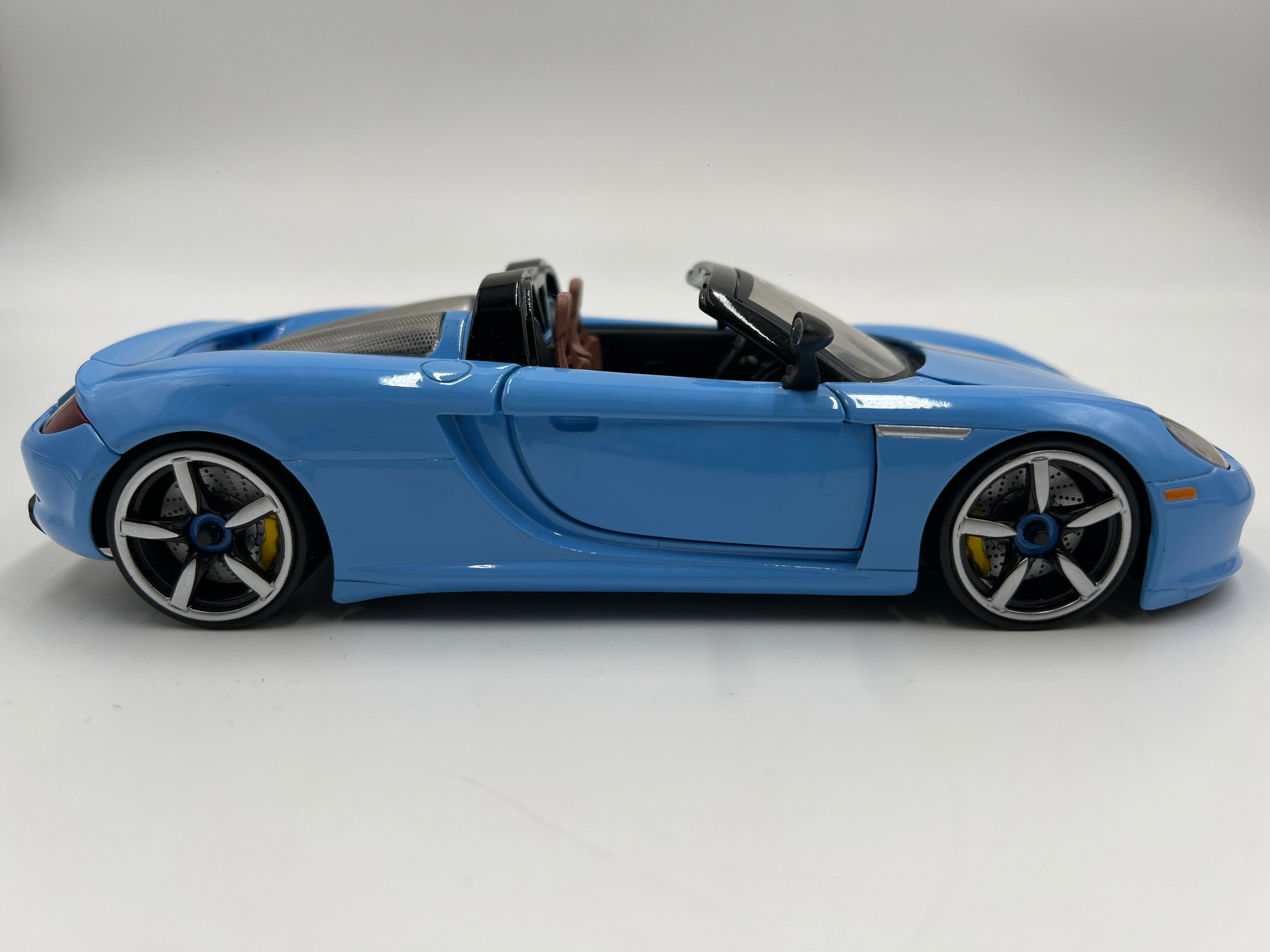 Jada Toys 1/24 Scale Pink Slips Porsche Carrera GT Light Blue Loose - Image 4