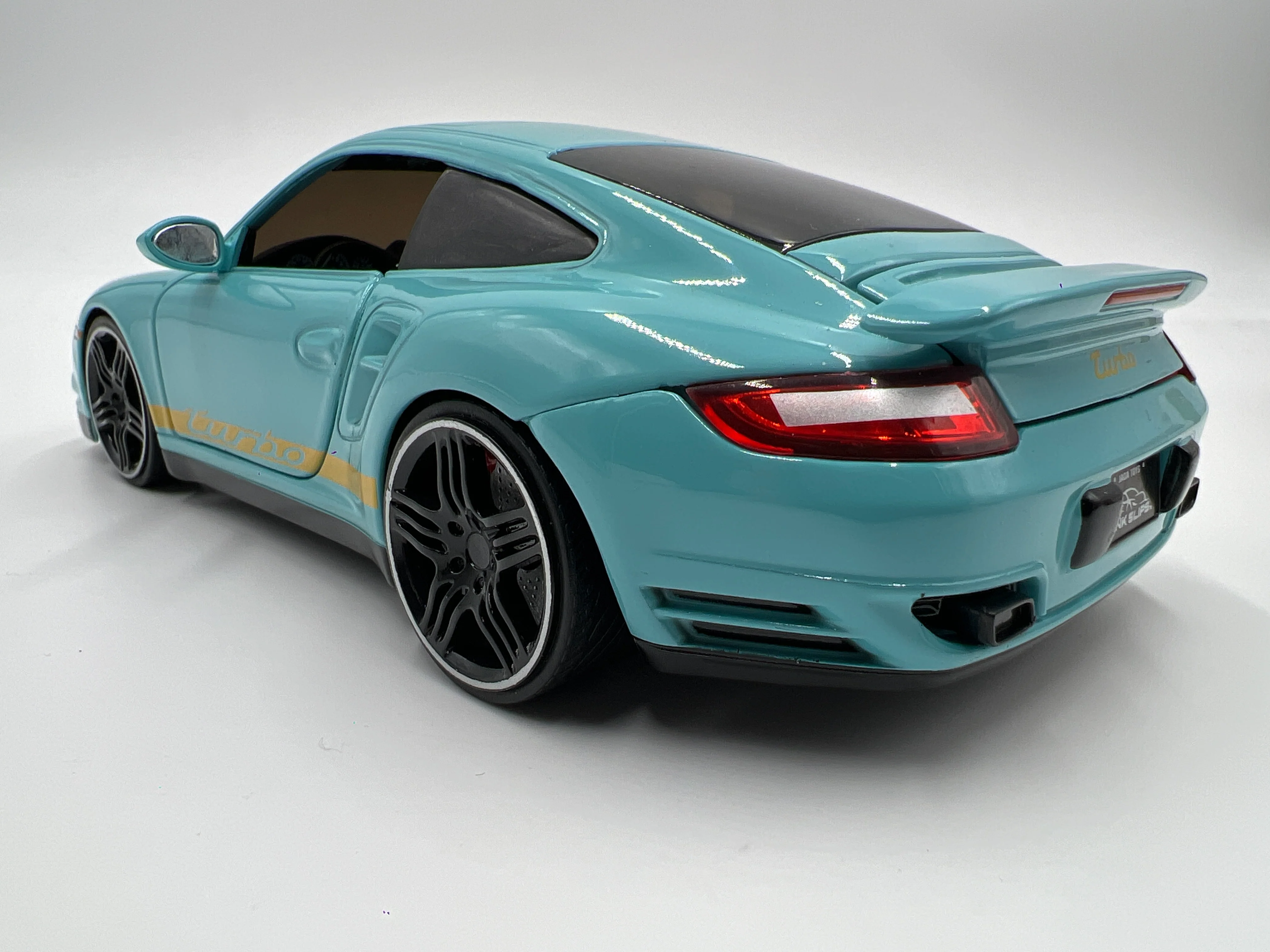 Jada Toys 1/24 Scale Pink Slips 2007 Porsche 911 Turbo Light Blue Loose - Image 2
